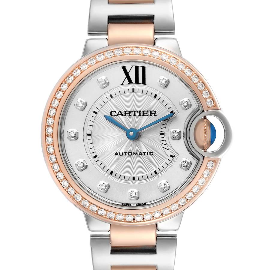 The Cartier Ballon Bleu WE902077 Women's Steel and Gold (two tone) Silver Dial watch is shown from a frontal angle, highlighting its face, bezel, and part of the bracelet.