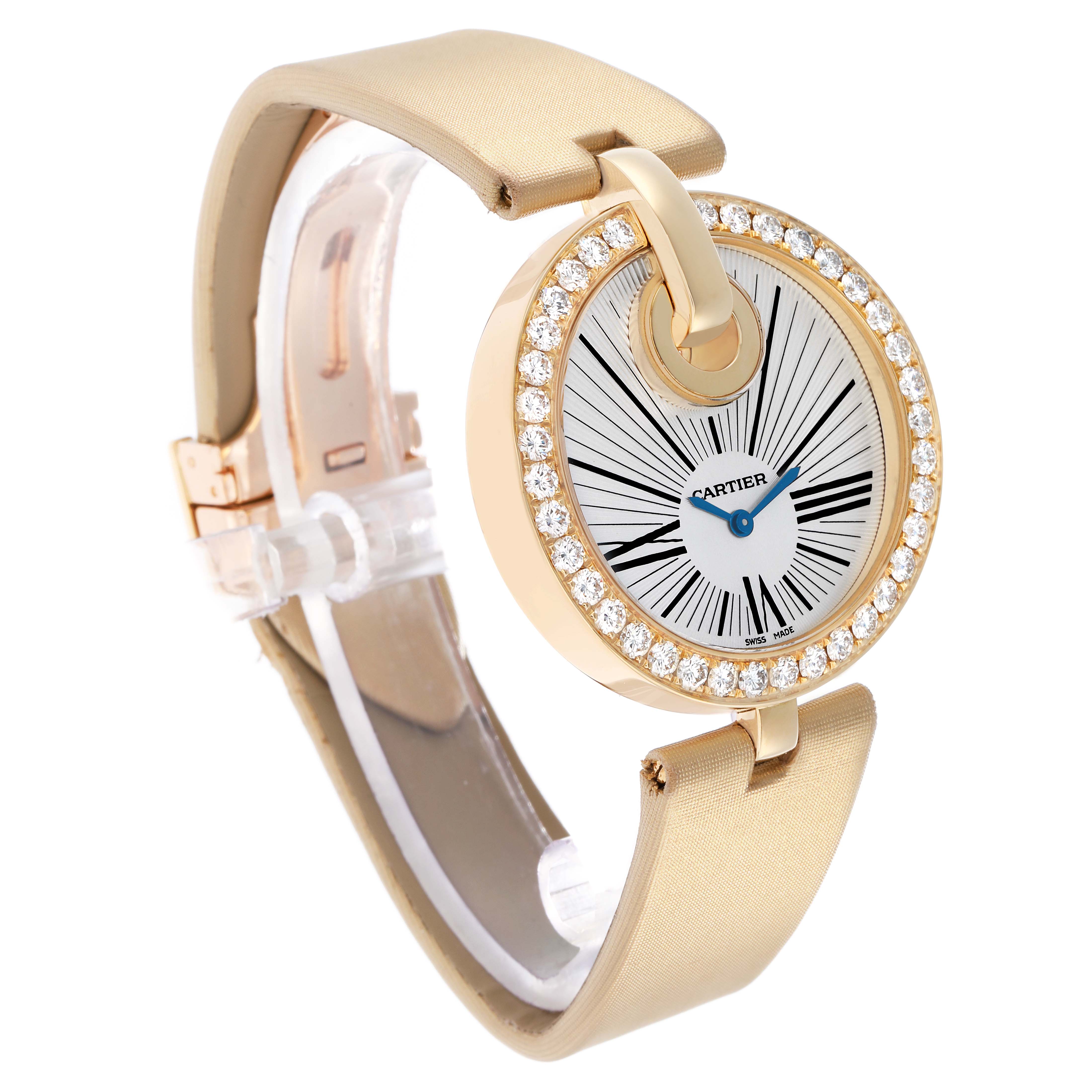 The Cartier Ballon Bleu WG600010 Women's Yellow Gold Silver Dial watch is shown at a three-quarter angle, highlighting its face, diamond bezel, and luxurious strap.