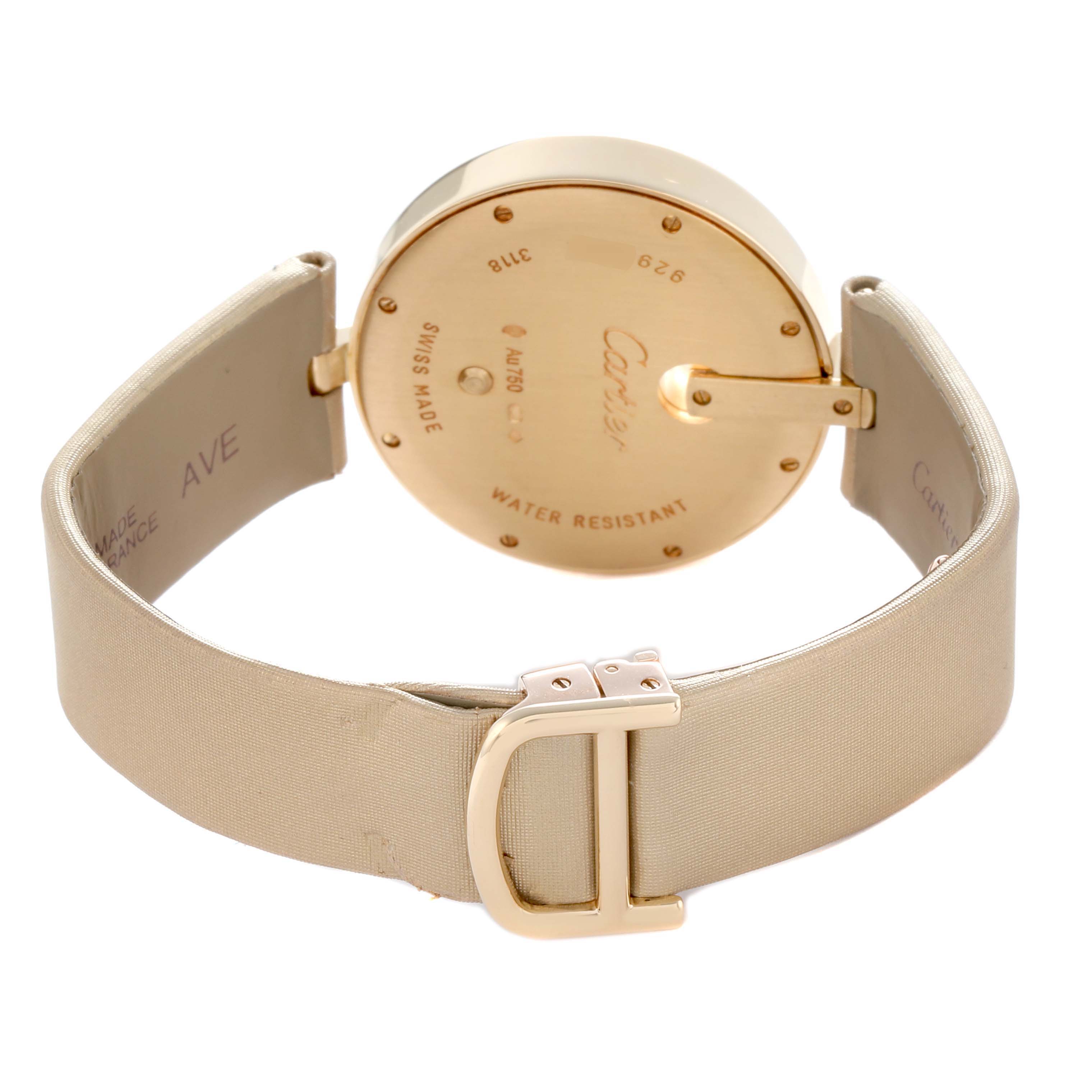 The image shows the back of a Cartier Ballon Bleu WG600010 Women's Yellow Gold Silver Dial watch, highlighting the case back and part of the strap and buckle.