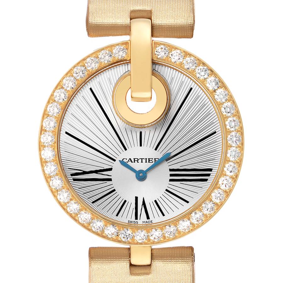 The image shows a top-down view of a Cartier Ballon Bleu WG600010 Women's Yellow Gold Silver Dial watch featuring a diamond-set bezel and Roman numeral dial.