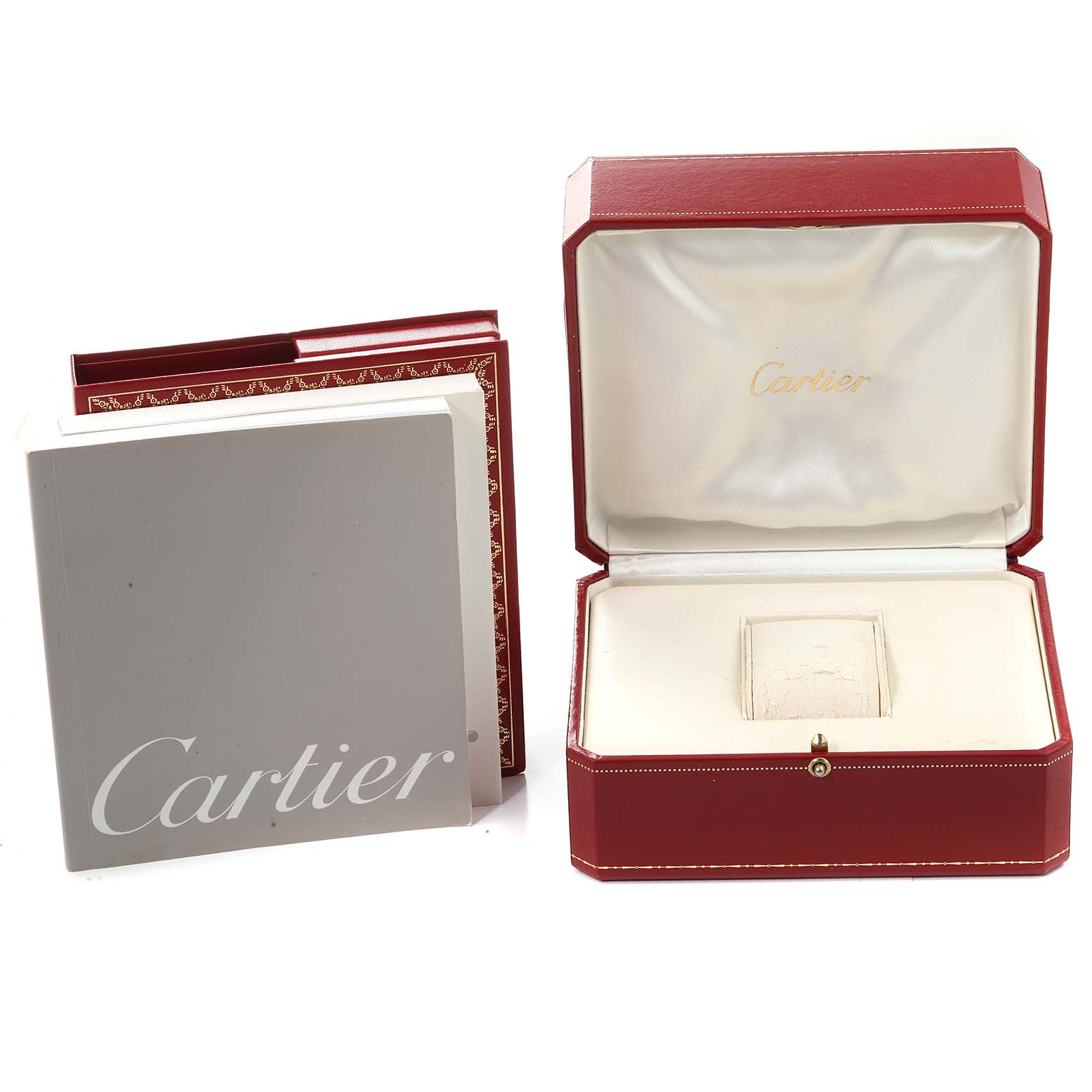 The image shows the open case and manuals for the Cartier Pasha W31077M7 Men's Stainless Steel Black Dial W31077M7 Men's Stainless Steel Black Dial watch from a frontal angle.