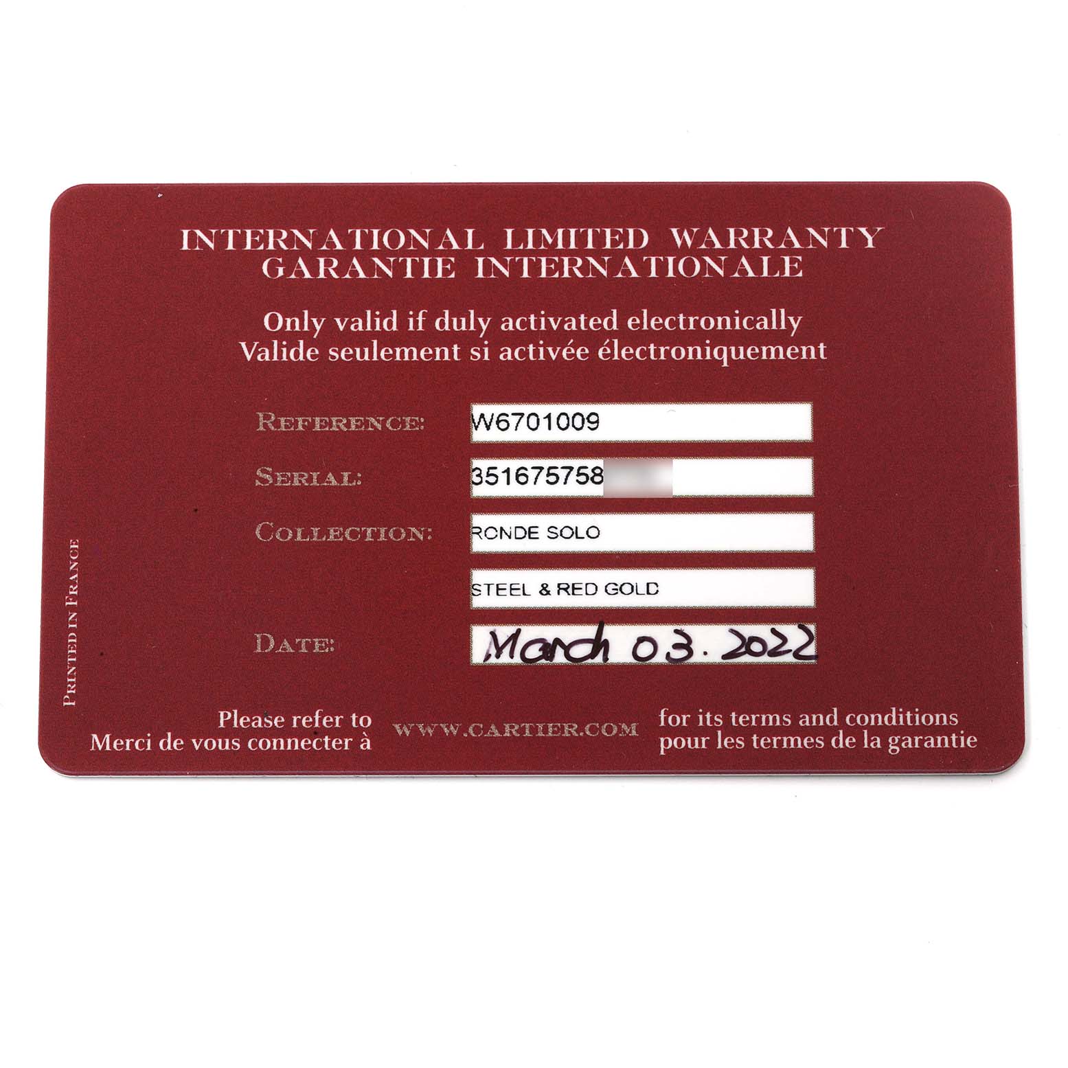 The image shows an International Limited Warranty card for the Cartier Ronde W6701009 Men
s Yellow Gold Silver Dial W6701009 Men
s Yellow Gold Silver Dial Solo model.