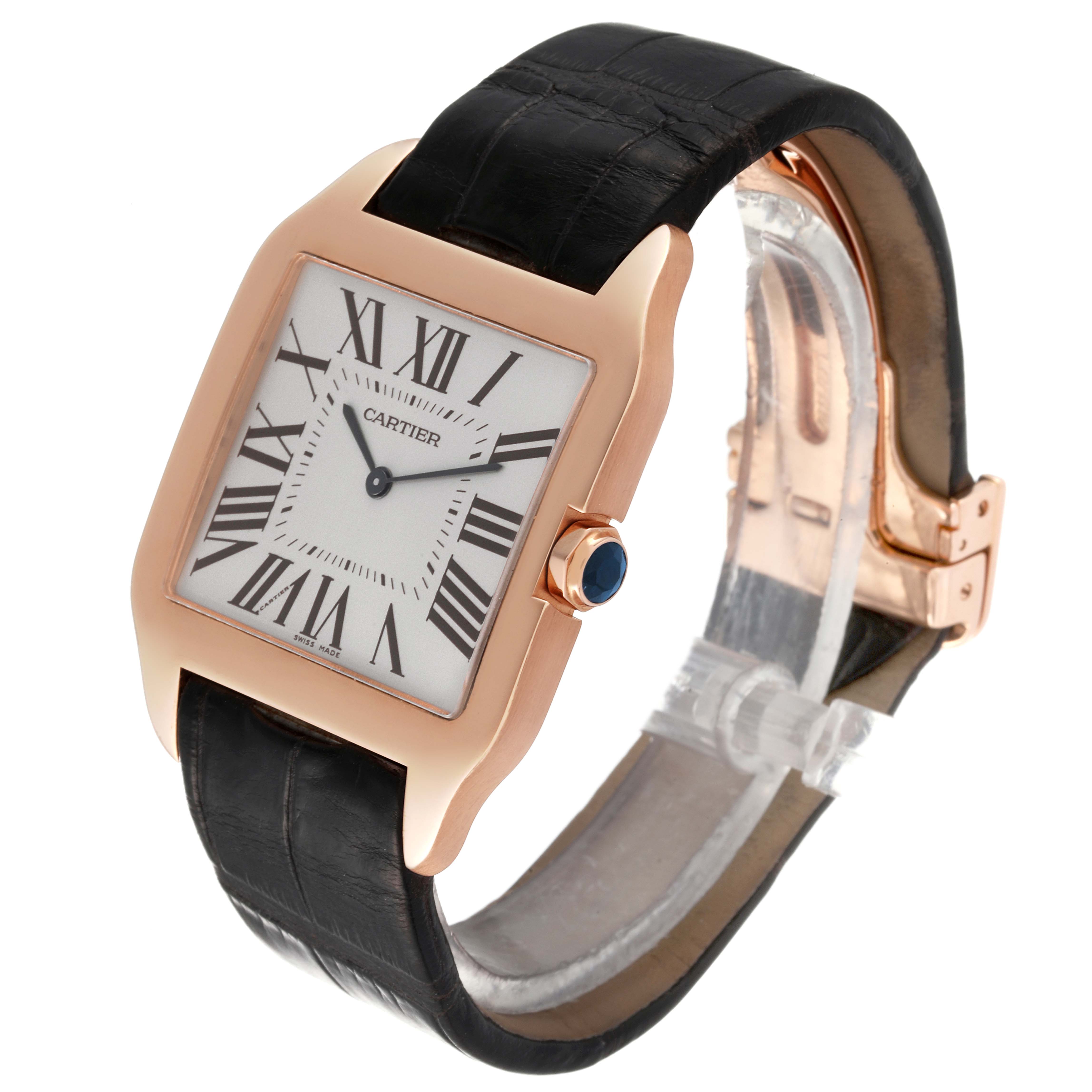 The image shows a Cartier Santos Dumont W2006951 Men's Rose Gold Silver Dial W2006951 Men's Rose Gold Silver Dial watch angled from the front-left, highlighting its square face, Roman numerals, and leather strap.