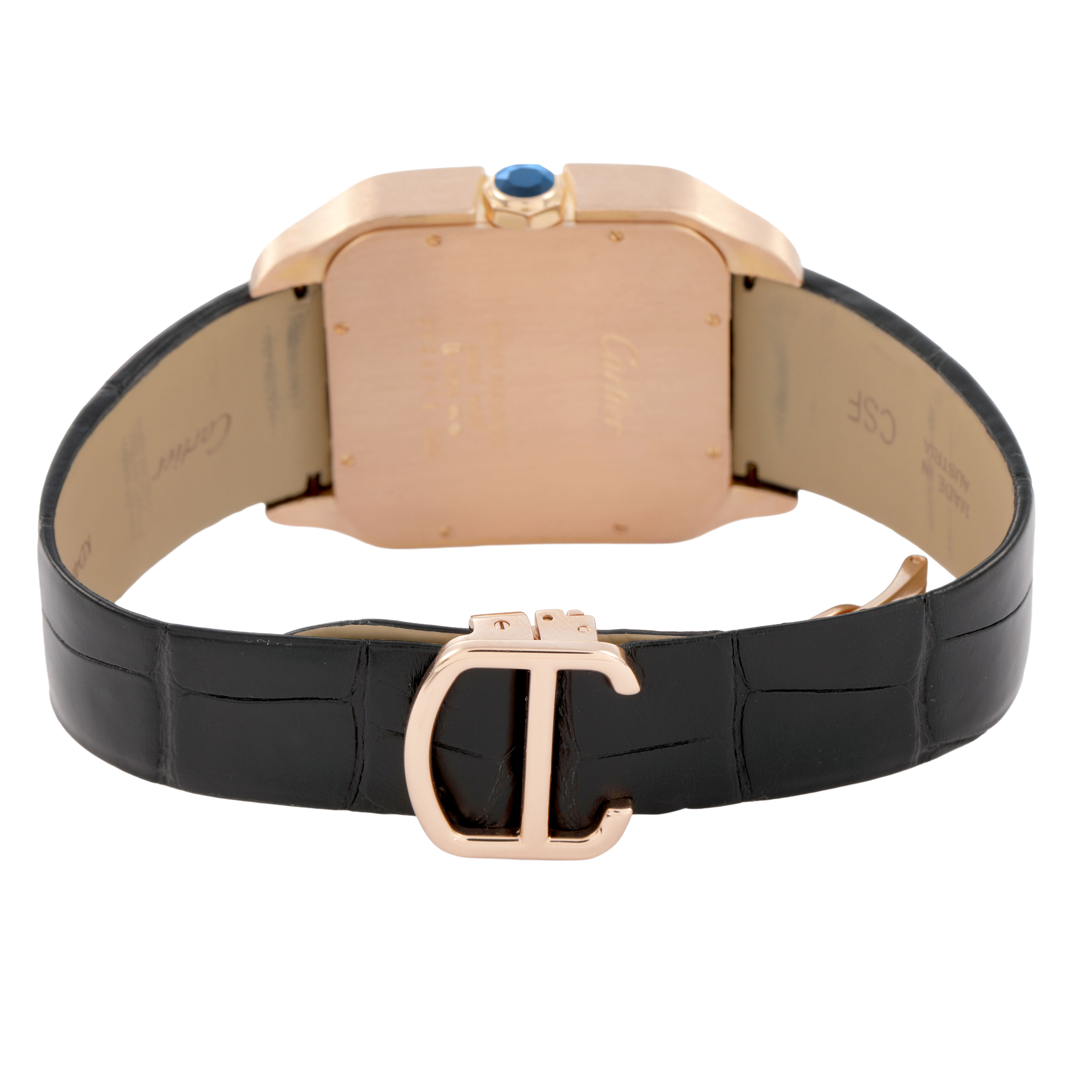The image shows the back of the Cartier Santos Dumont W2020067 Men's Rose Gold Silver Dial watch, highlighting the case back and leather strap with a clasp.