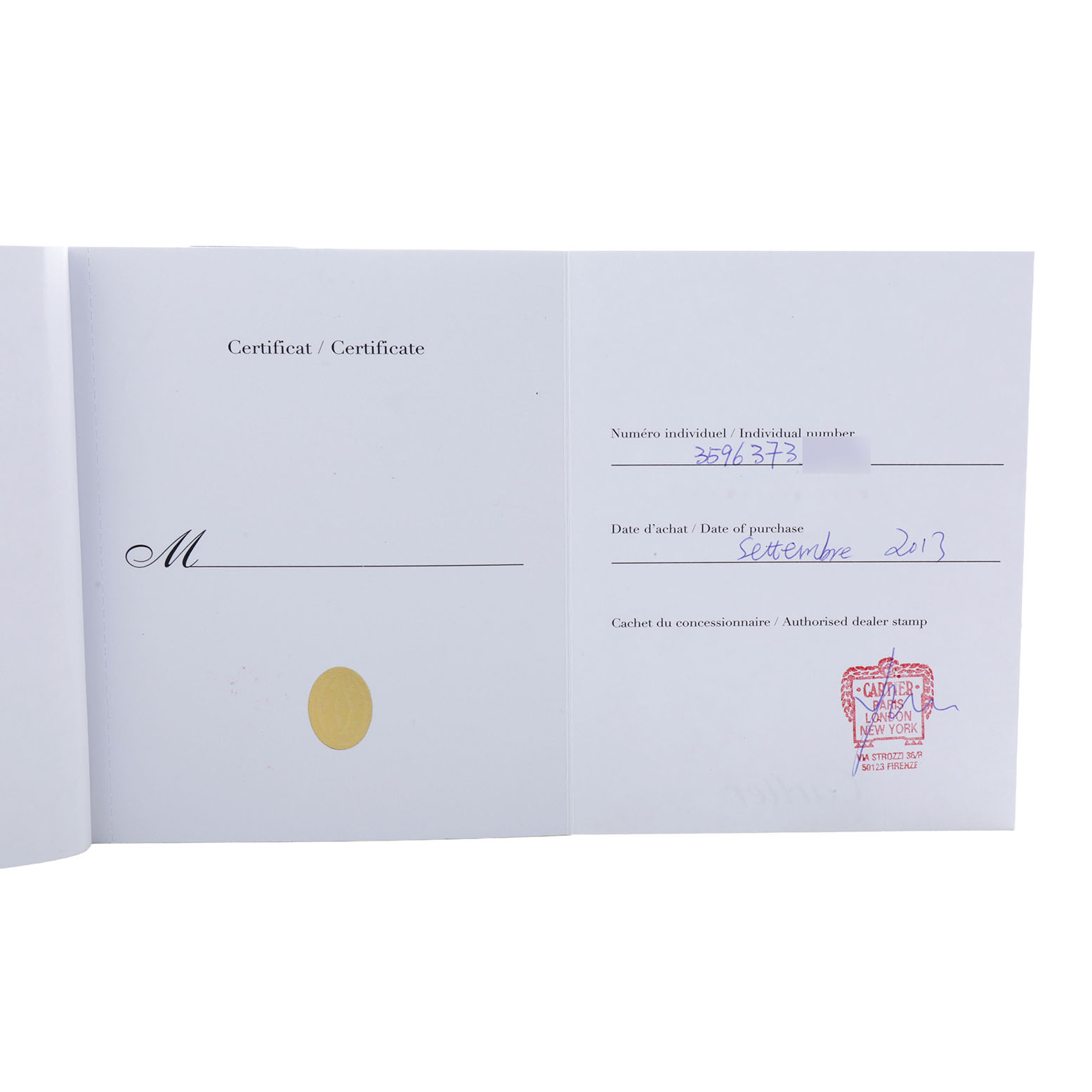 This image shows the certificate booklet for a Santos Dumont model by Cartier, displaying purchase details and an official stamp.