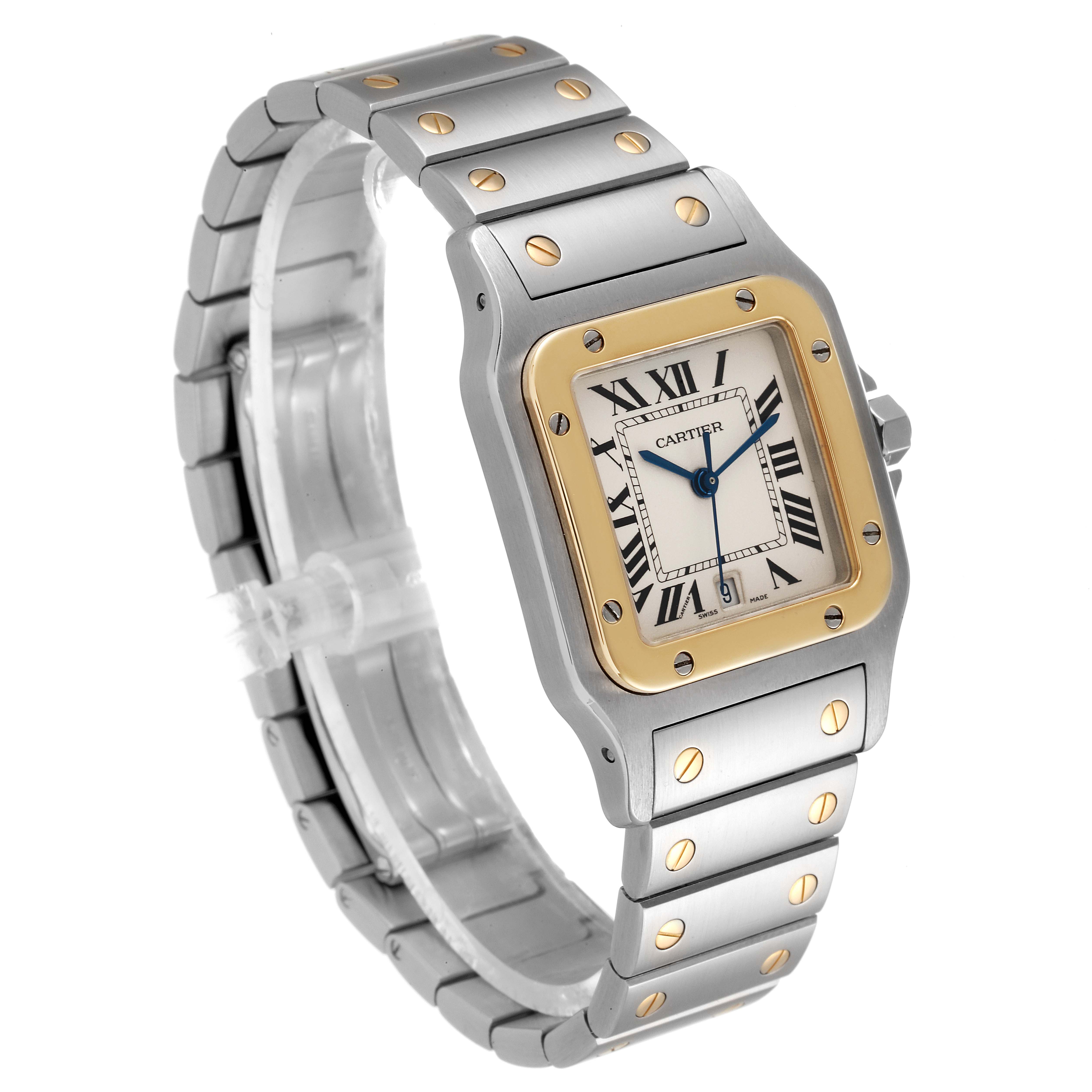 This Cartier Santos W20011C4 Men's Steel and Gold (two tone) Silver Dial W20011C4 Men's Steel and Gold (two tone) Silver Dial watch is shown at a three-quarter angle, highlighting the face, bezel, bracelet, and clasp.
