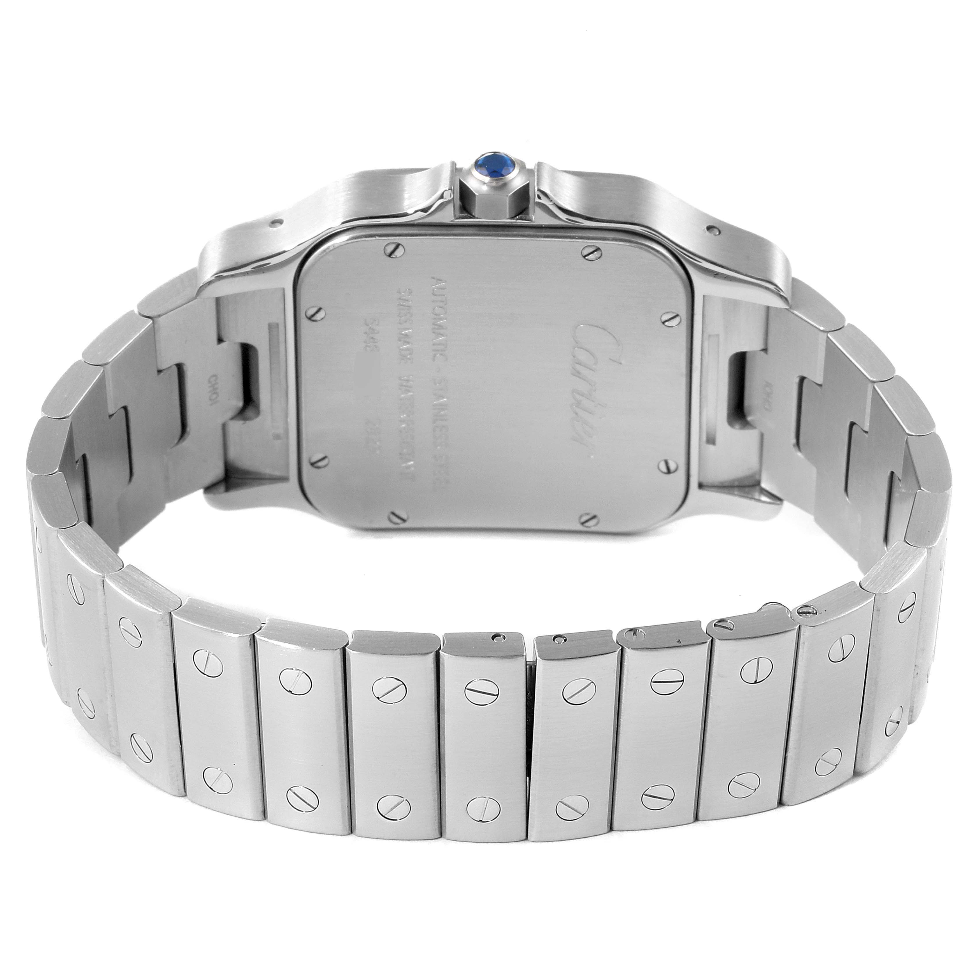 The image shows the back case and bracelet of a Santos model watch by Cartier, viewed from the rear angle.
