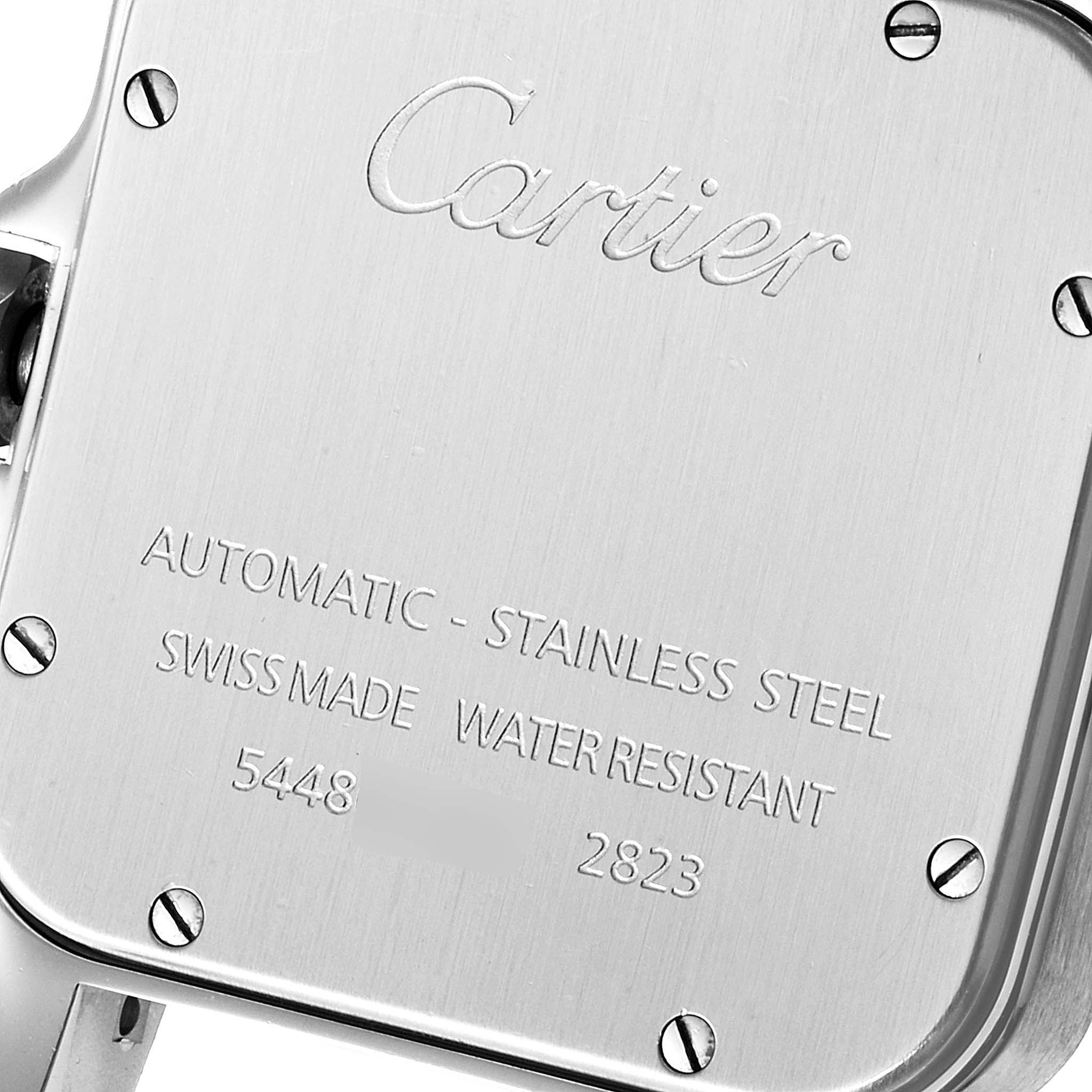 The image shows the back case of the Cartier Santos W20098D6 Men
s Stainless Steel Silver Dial W20098D6 Men
s Stainless Steel Silver Dial watch engraved with brand details and specifications.