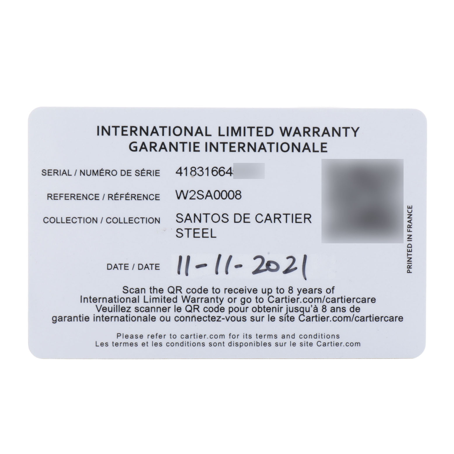 This is a warranty card for the Santos de Cartier watch model.
