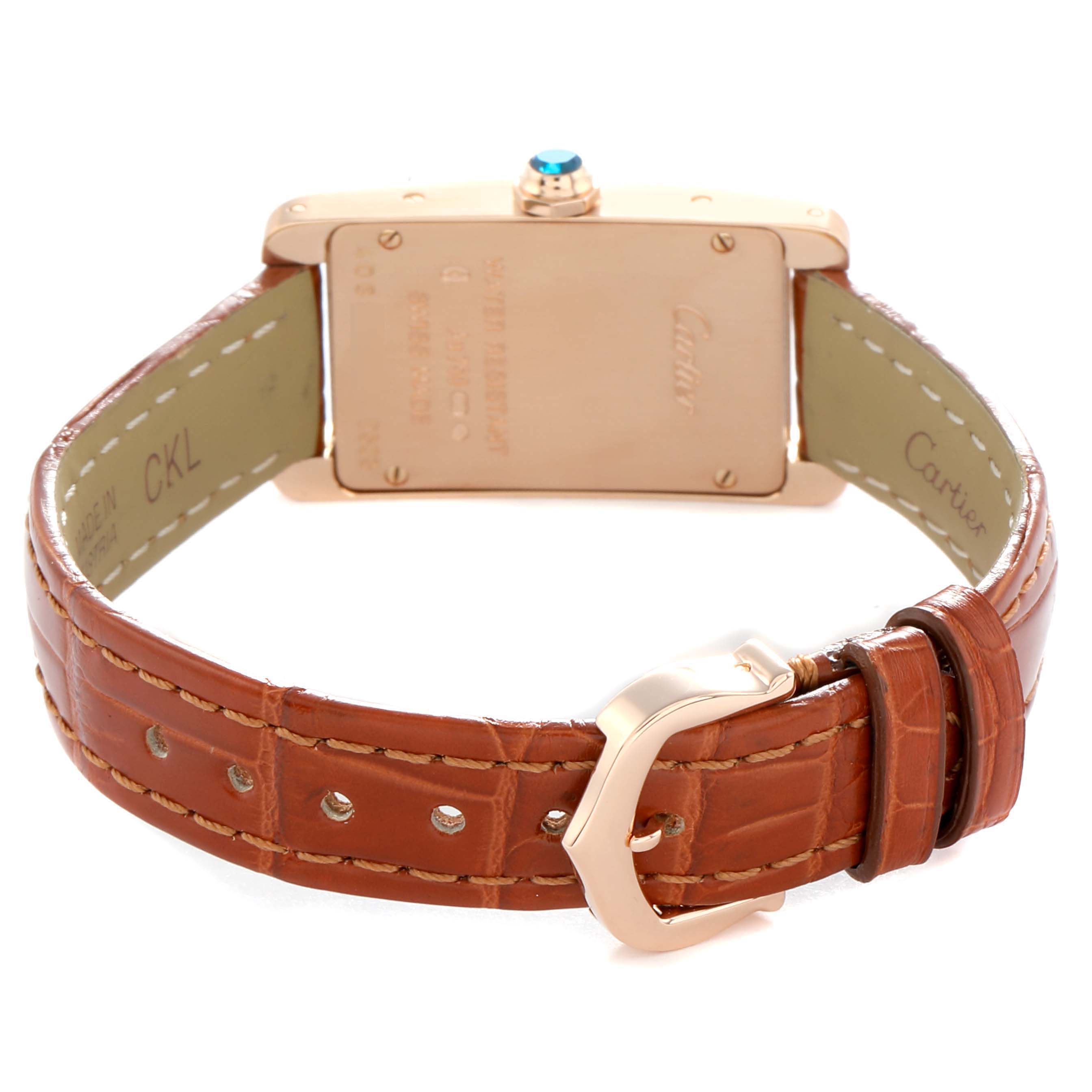 The image shows the back and side angle of the Cartier Tank Americaine W2607456 Women
s Rose Gold Silver Dial watch, focusing on the strap and buckle.