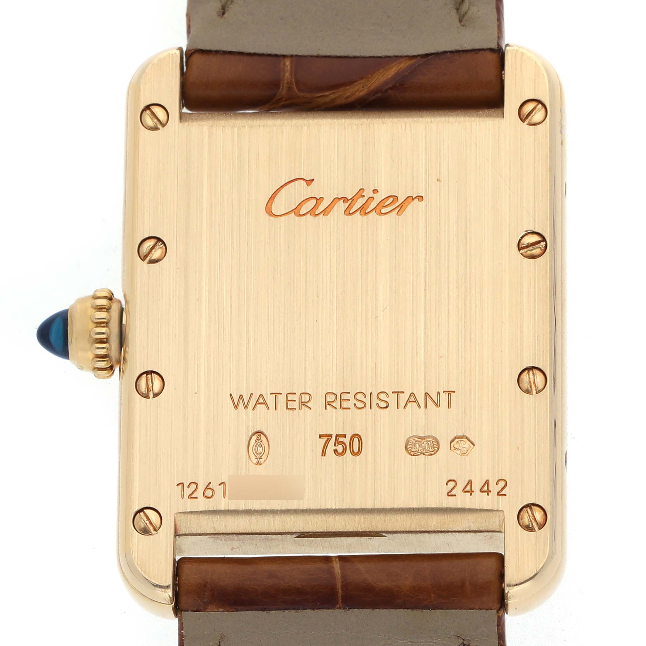 The image shows the back of the Cartier Tank Louis W1529856 Women's Yellow Gold Silver Dial watch, featuring the brand name, water resistance, and serial numbers.