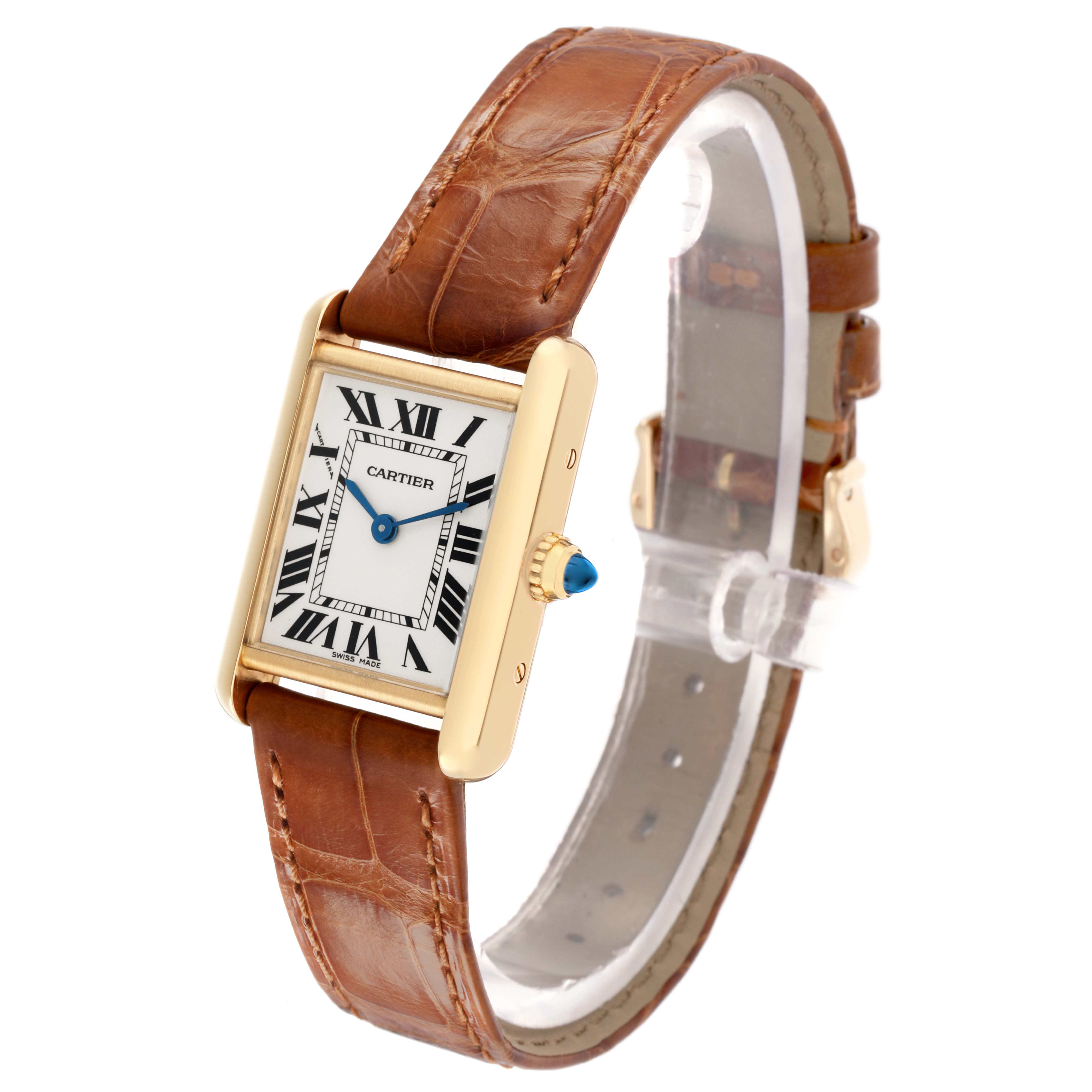 The Cartier Tank Louis W1529856 Women's Yellow Gold Silver Dial watch is shown at an angle displaying the face, crown, case, and brown leather strap.