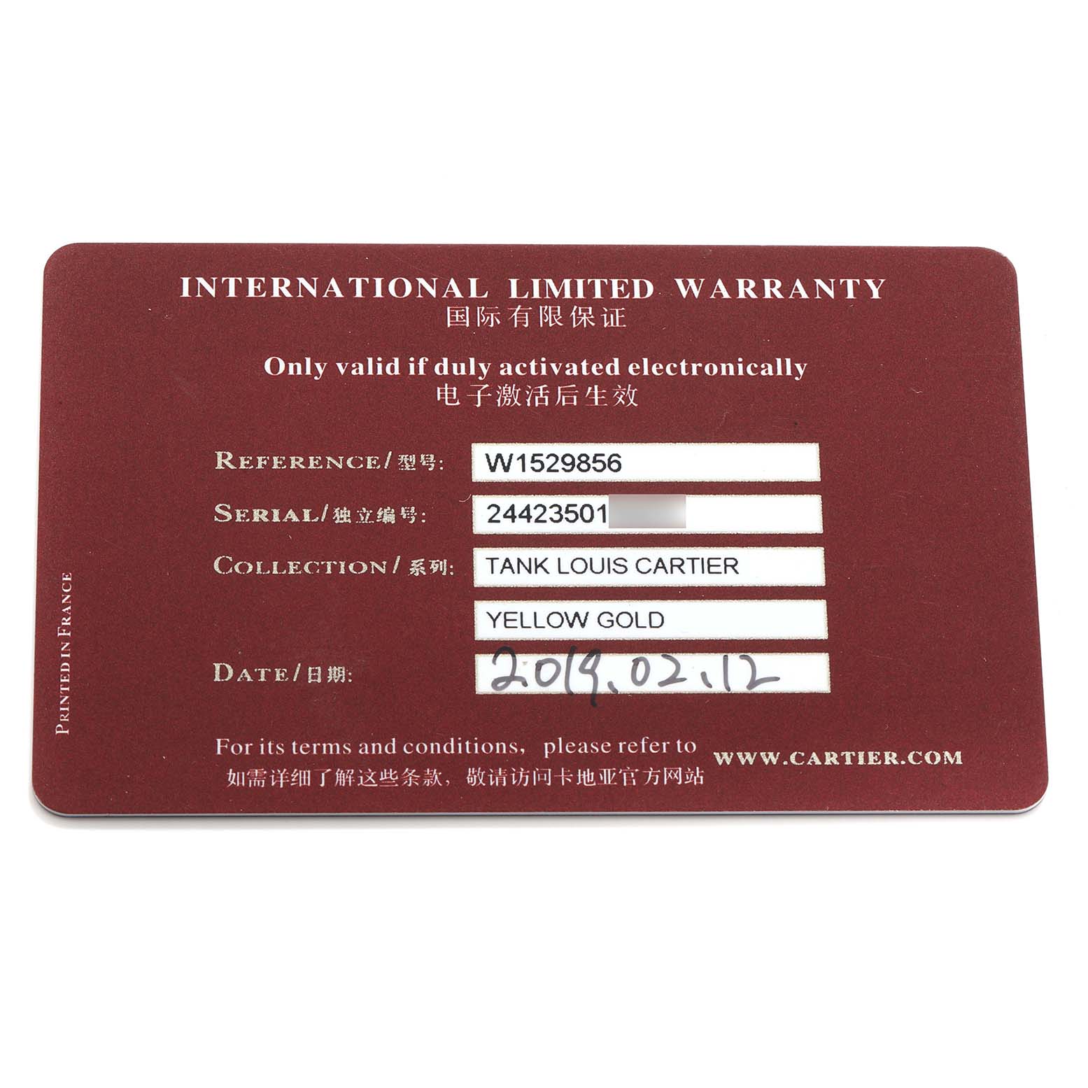 The image shows an International Limited Warranty card for the Cartier Tank Louis W1529856 Women's Yellow Gold Silver Dial model, detailing the model and serial numbers.