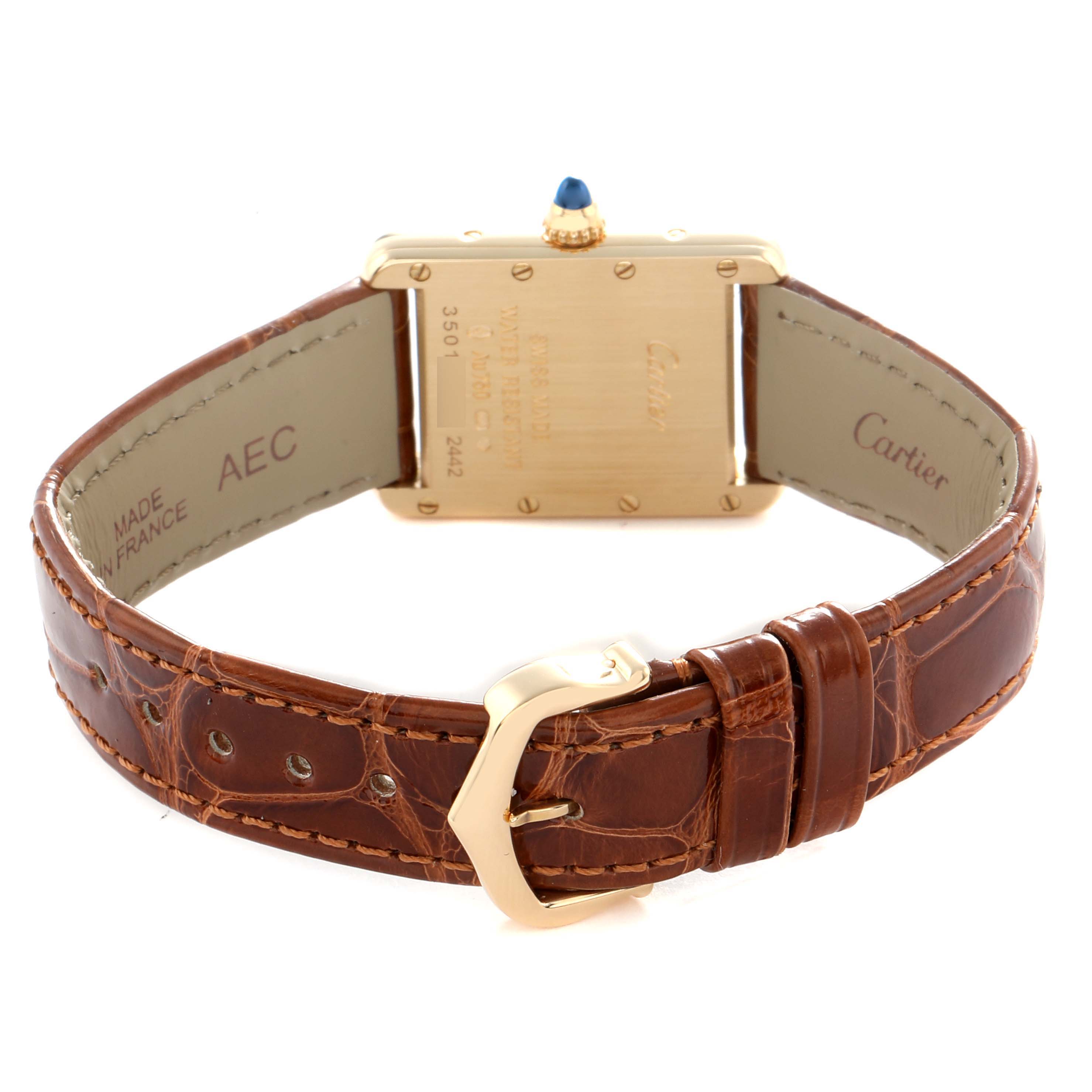 The image shows the back view of the Cartier Tank Louis W1529856 Women's Yellow Gold Silver Dial watch, highlighting the case, strap, and clasp.