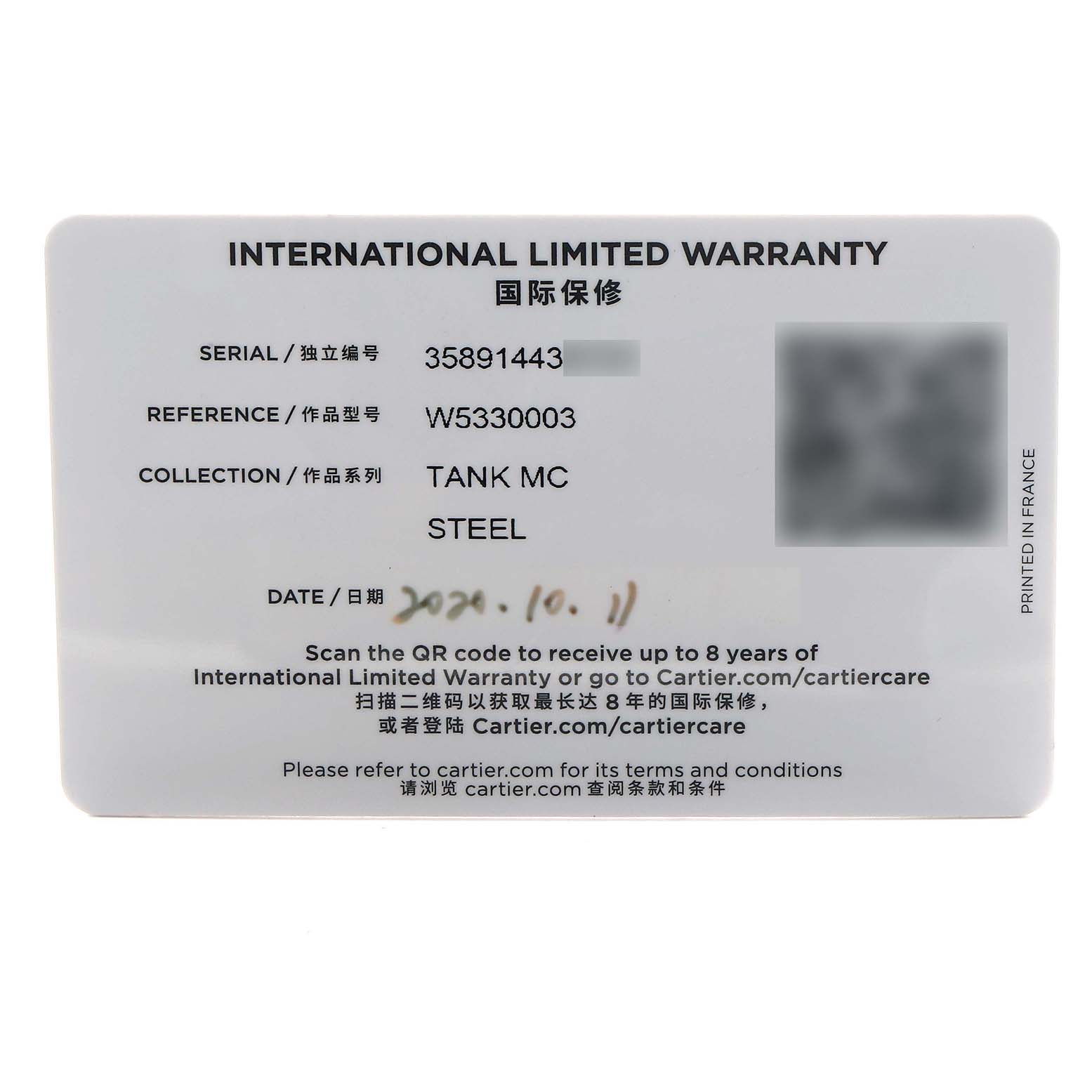 The image shows an International Limited Warranty card for the Cartier Tank MC W5330003 Men
s Stainless Steel Silver Dial watch, displaying serial and reference numbers.