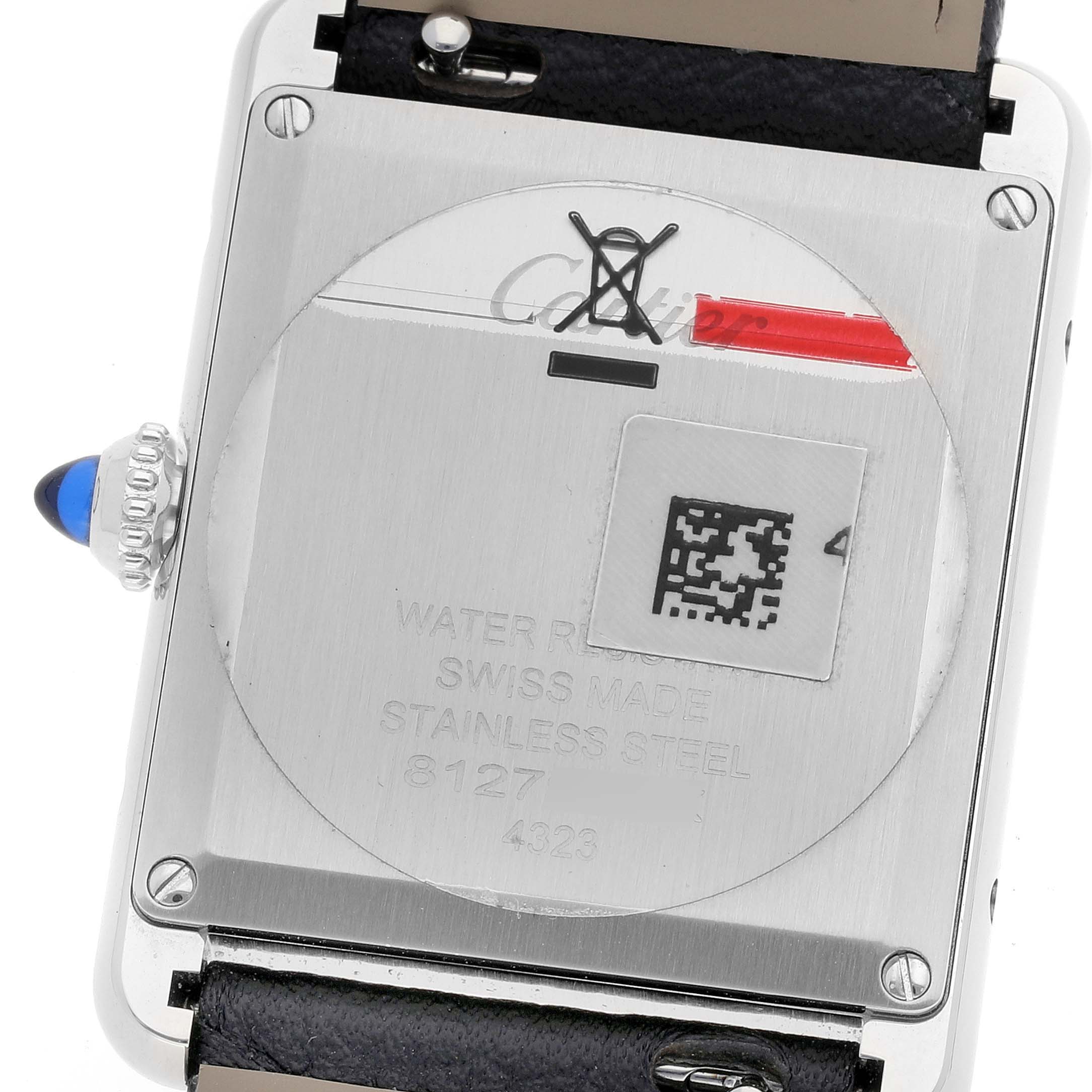 The image shows the back of the Cartier Tank Must WSTA0041 Women's Stainless Steel Silver Dial WSTA0041 Women's Stainless Steel Silver Dial watch, displaying details like the crown, screws, and inscriptions.