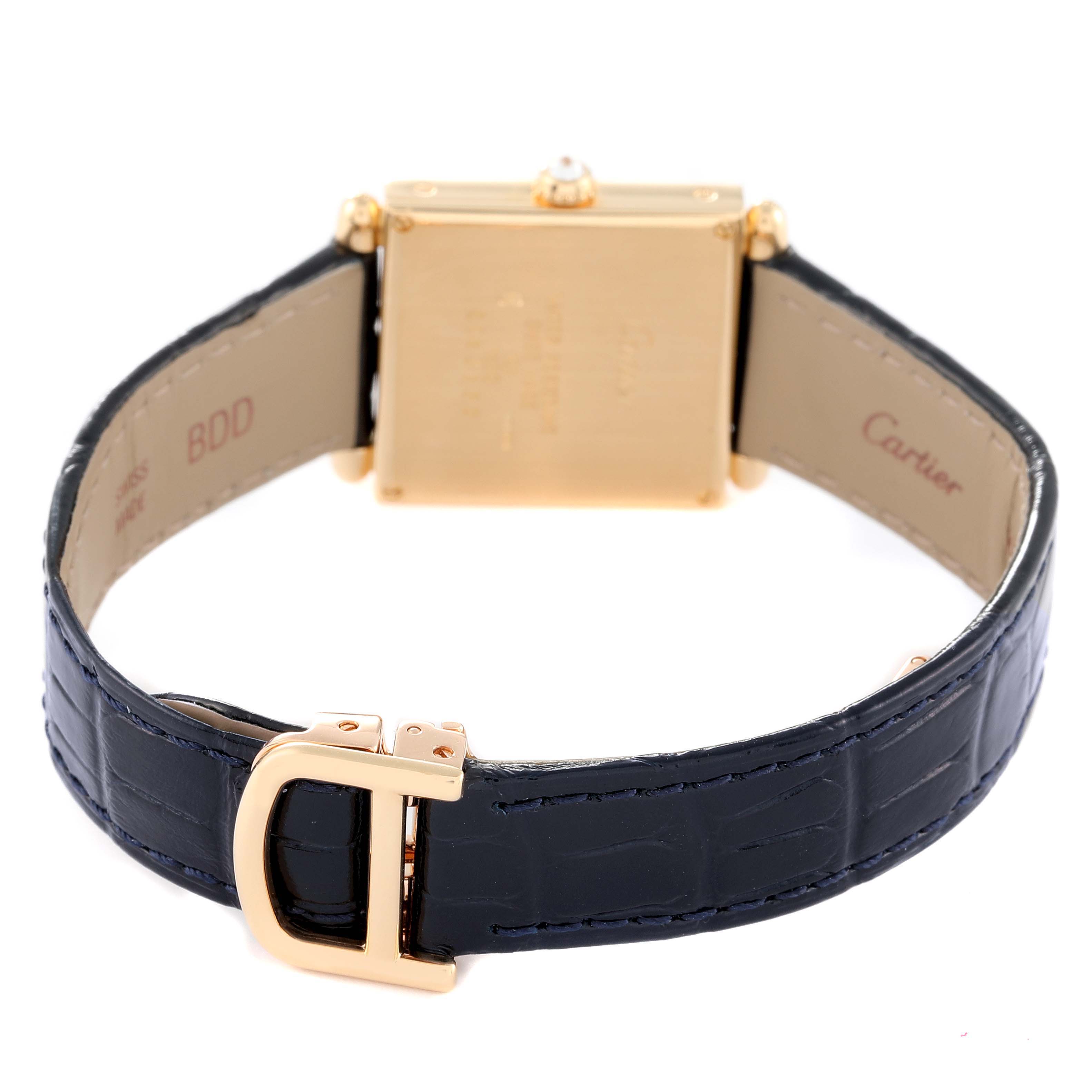 The image shows the back of a Cartier Tank Obus WB800251 Women's Yellow Gold Silver Dial WB800251 Women's Yellow Gold Silver Dial watch, highlighting its strap, buckle, and case.