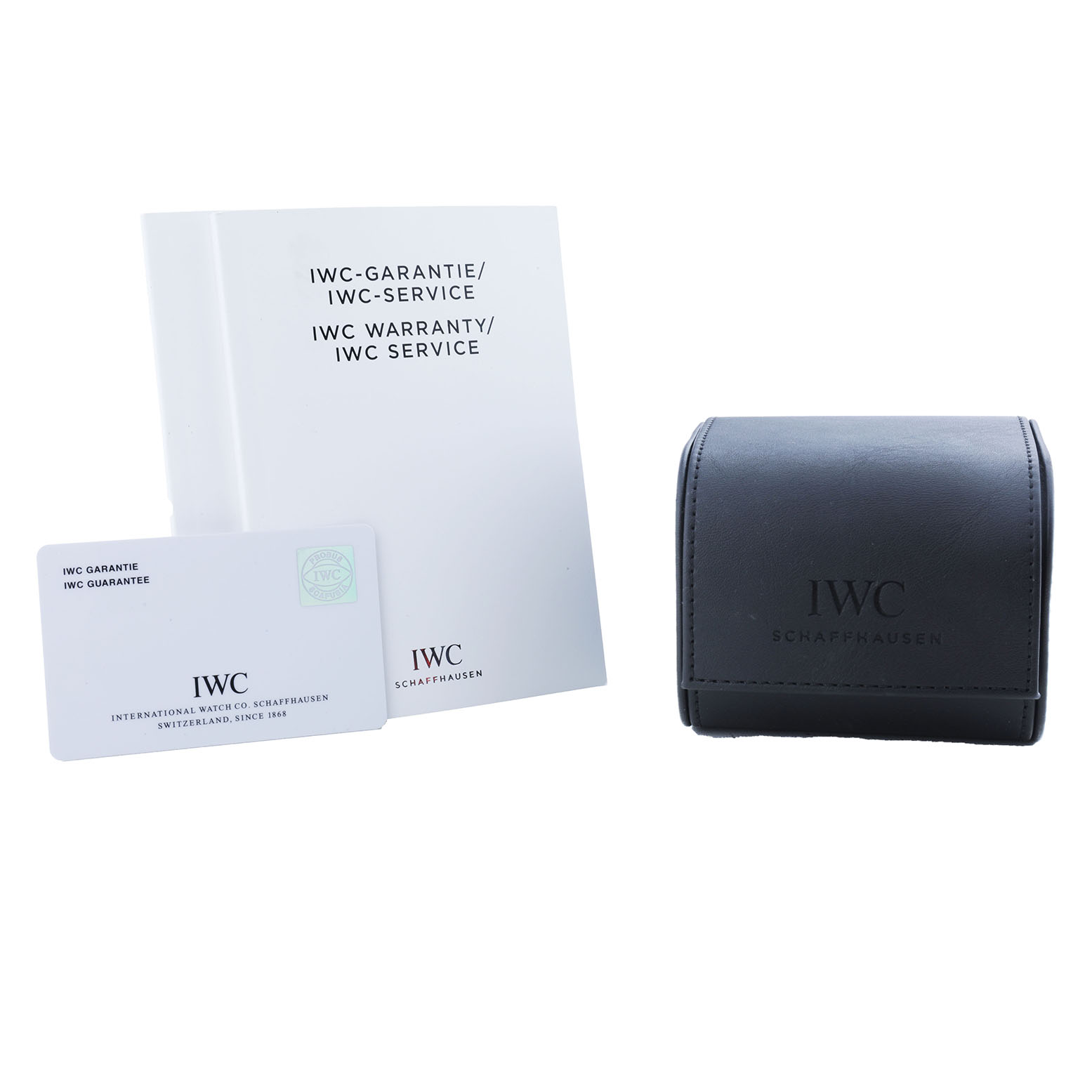 The image shows IWC Portofino IW510102 Men's Stainless Steel Black Dial watch accessories, including a warranty booklet, card, and a black leather case.