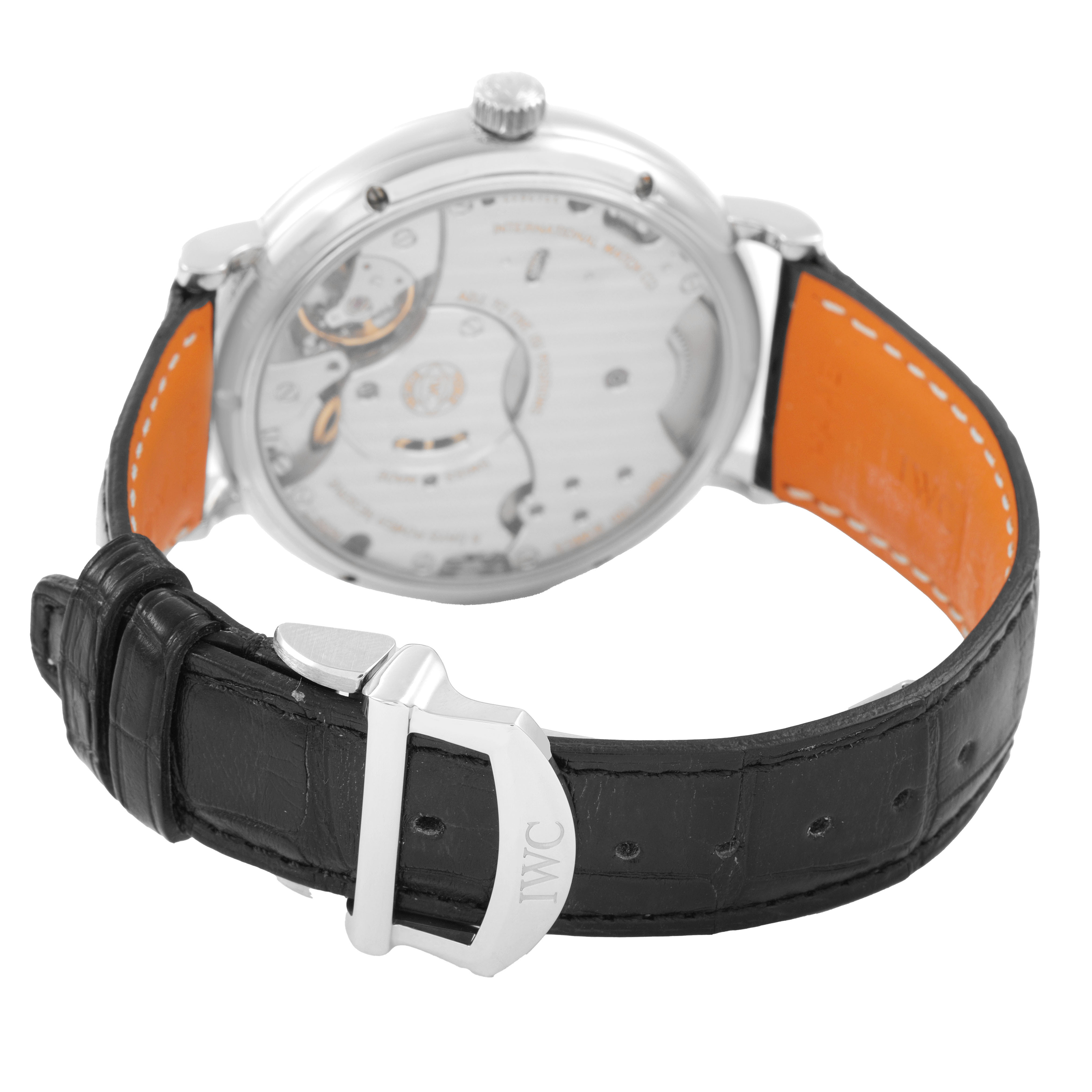 The IWC Portofino IW510102 Men's Stainless Steel Black Dial watch is shown from the back, highlighting the movement and leather strap.