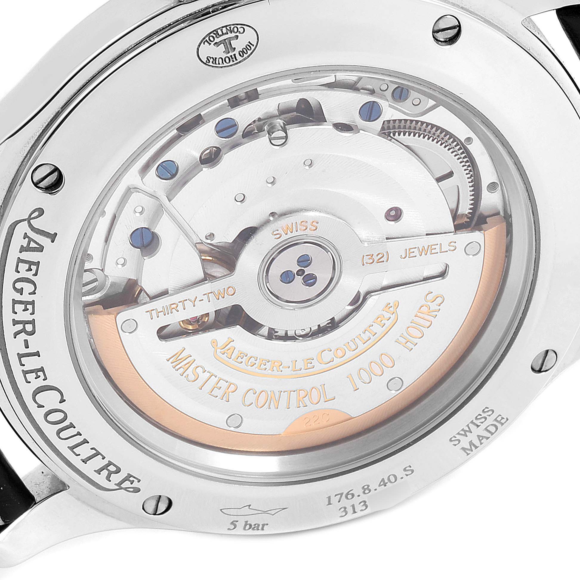 The image shows the back view of the Jaeger-LeCoultre Master Control watch, highlighting its intricate movement and engravings.