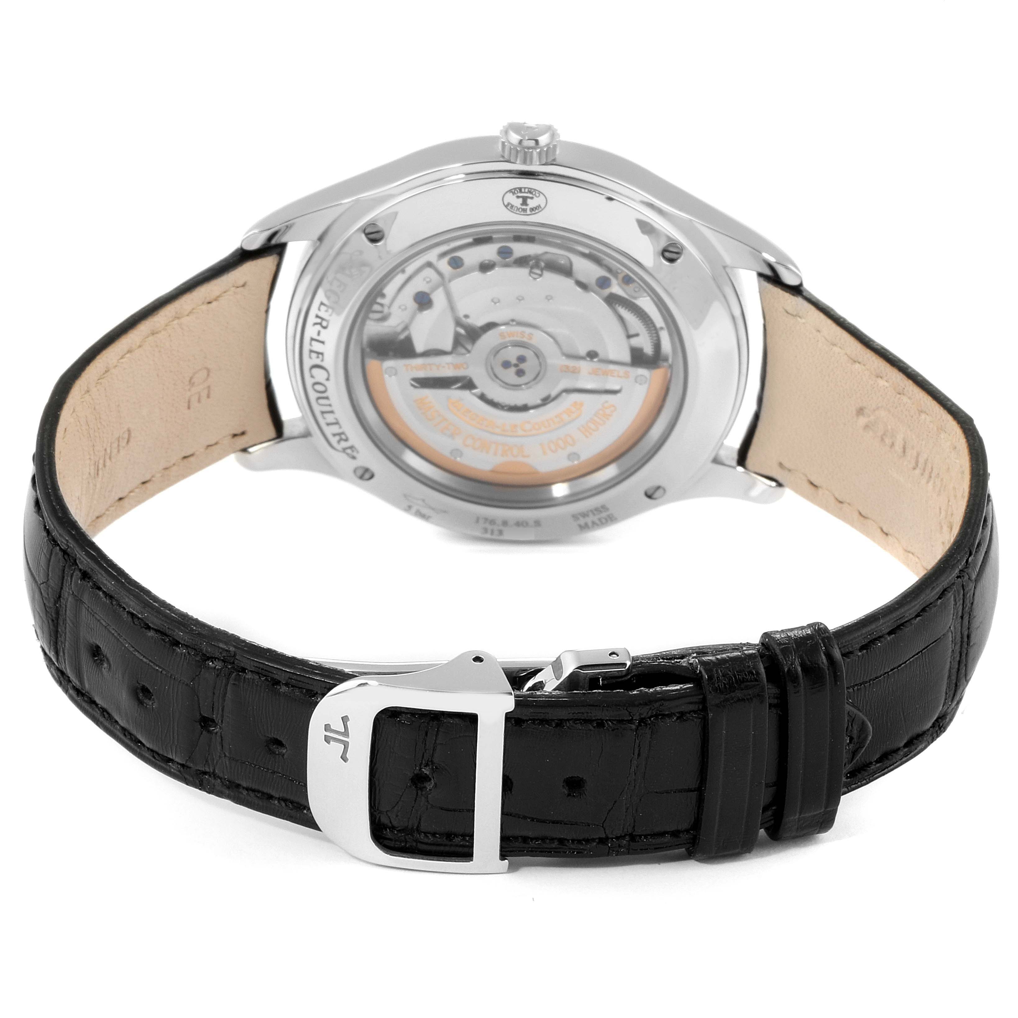The image shows the back view of a Jaeger-LeCoultre Master watch, highlighting the movement and leather strap.