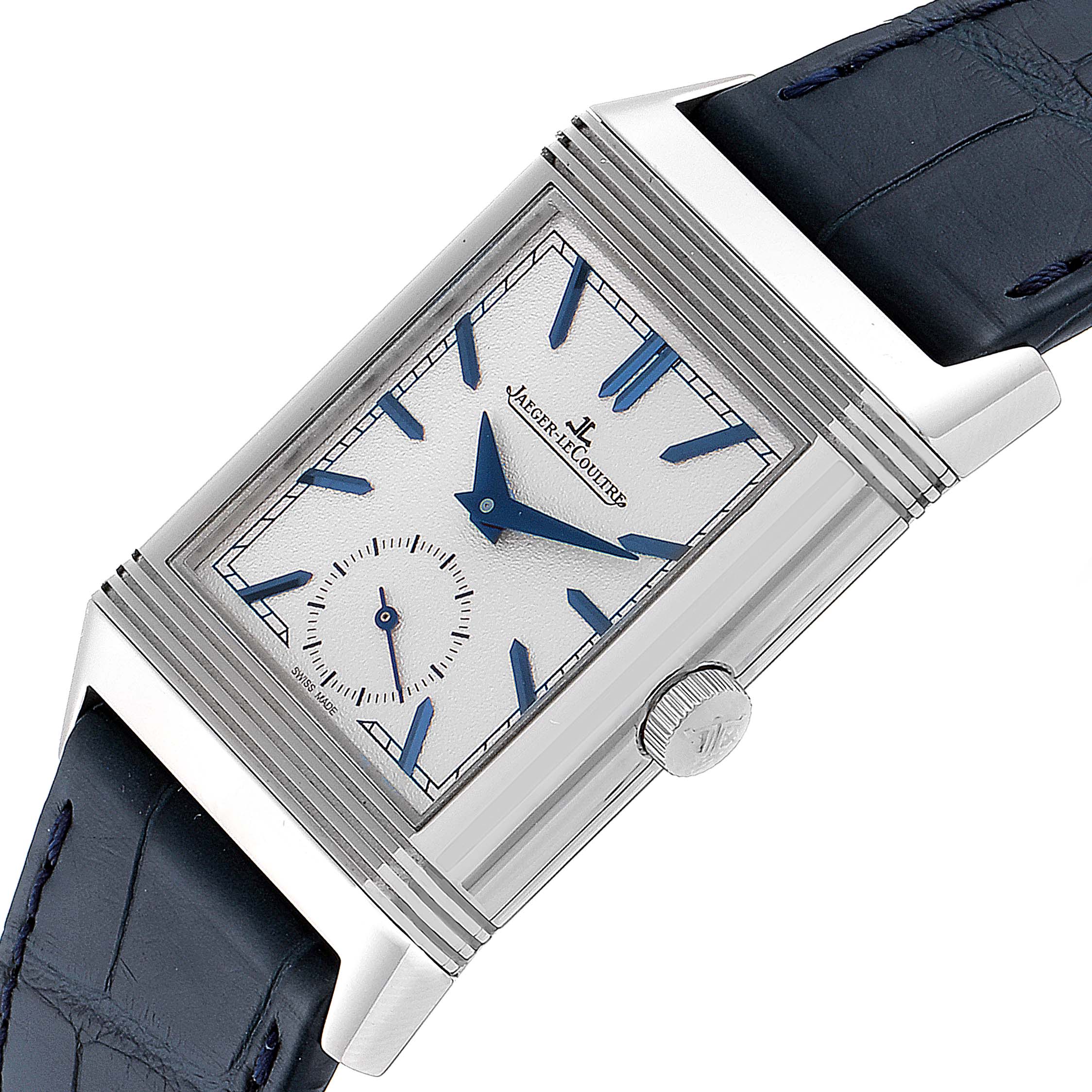 The image shows an angled view of a Jaeger LeCoultre Reverso Q3908420 Men's Stainless Steel Silver Dial Q3908420 Men's Stainless Steel Silver Dial watch, highlighting the dial, crown, and leather strap.