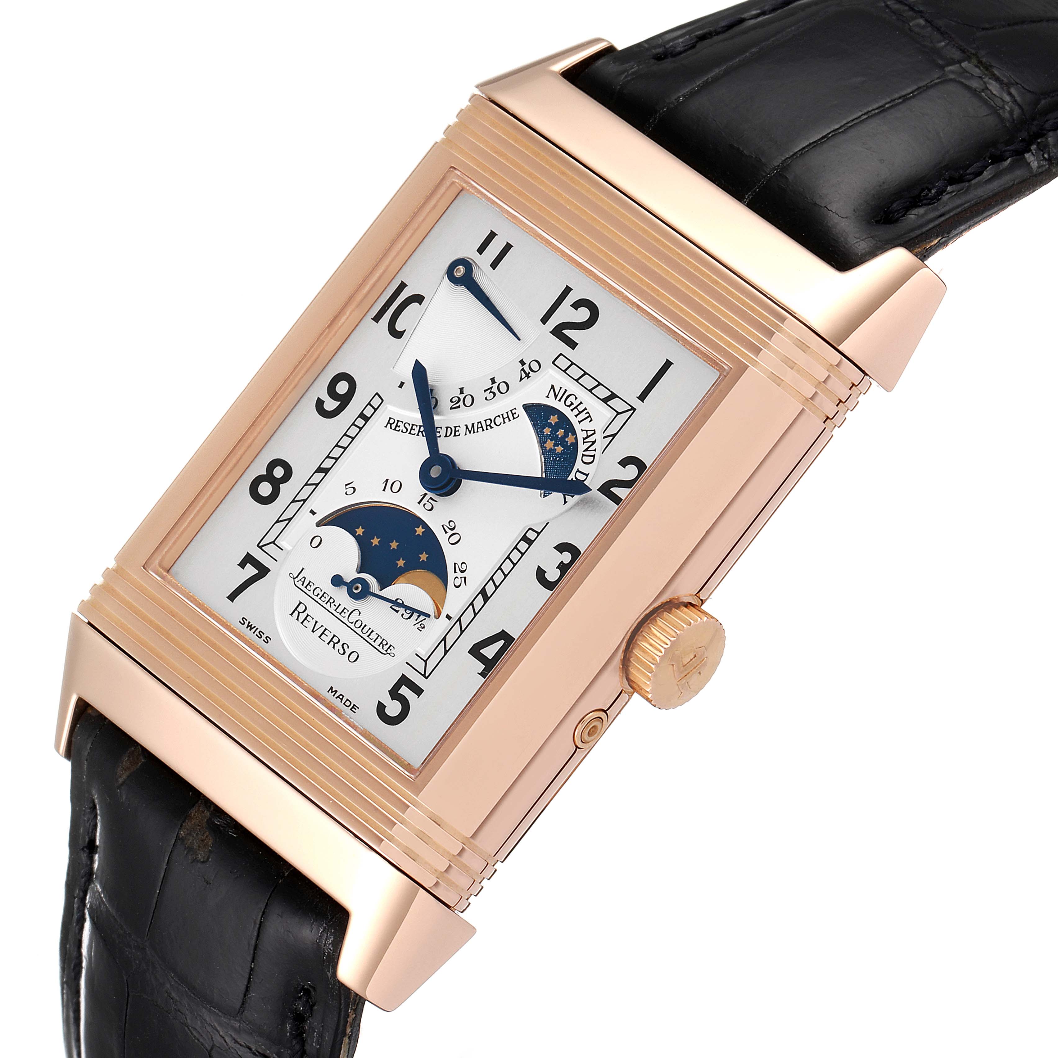 The image shows a close-up, angled view of a Jaeger LeCoultre Reverso Q2752420 Men
s Rose Gold Silver Dial Q2752420 Men
s Rose Gold Silver Dial watch, highlighting the face, crown, and part of the strap.