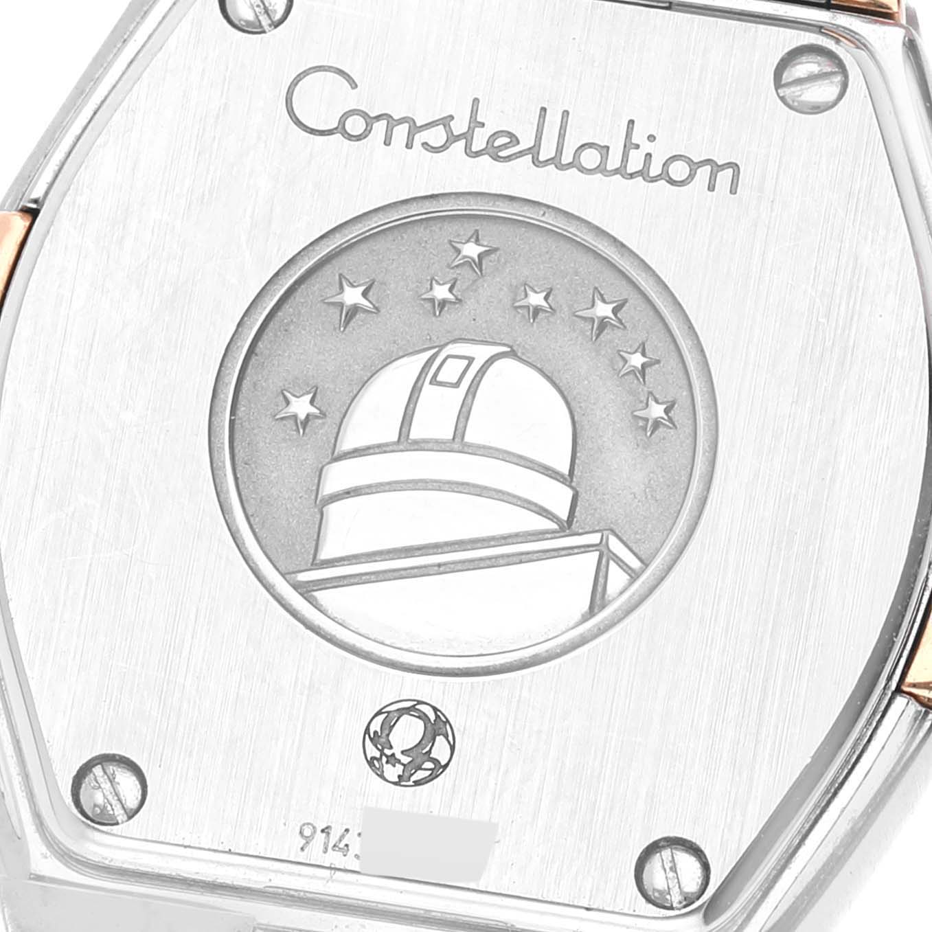 This image shows the back of the Omega 123.25.24.60.53.001 Women's Steel and Gold (two tone) Blue Dial 123.25.24.60.53.001 Women's Steel and Gold (two tone) Blue Dial Constellation Steel Rose Gold Diamond Ladies Watch 123.25.24.60.53.001 with its engraved logo.