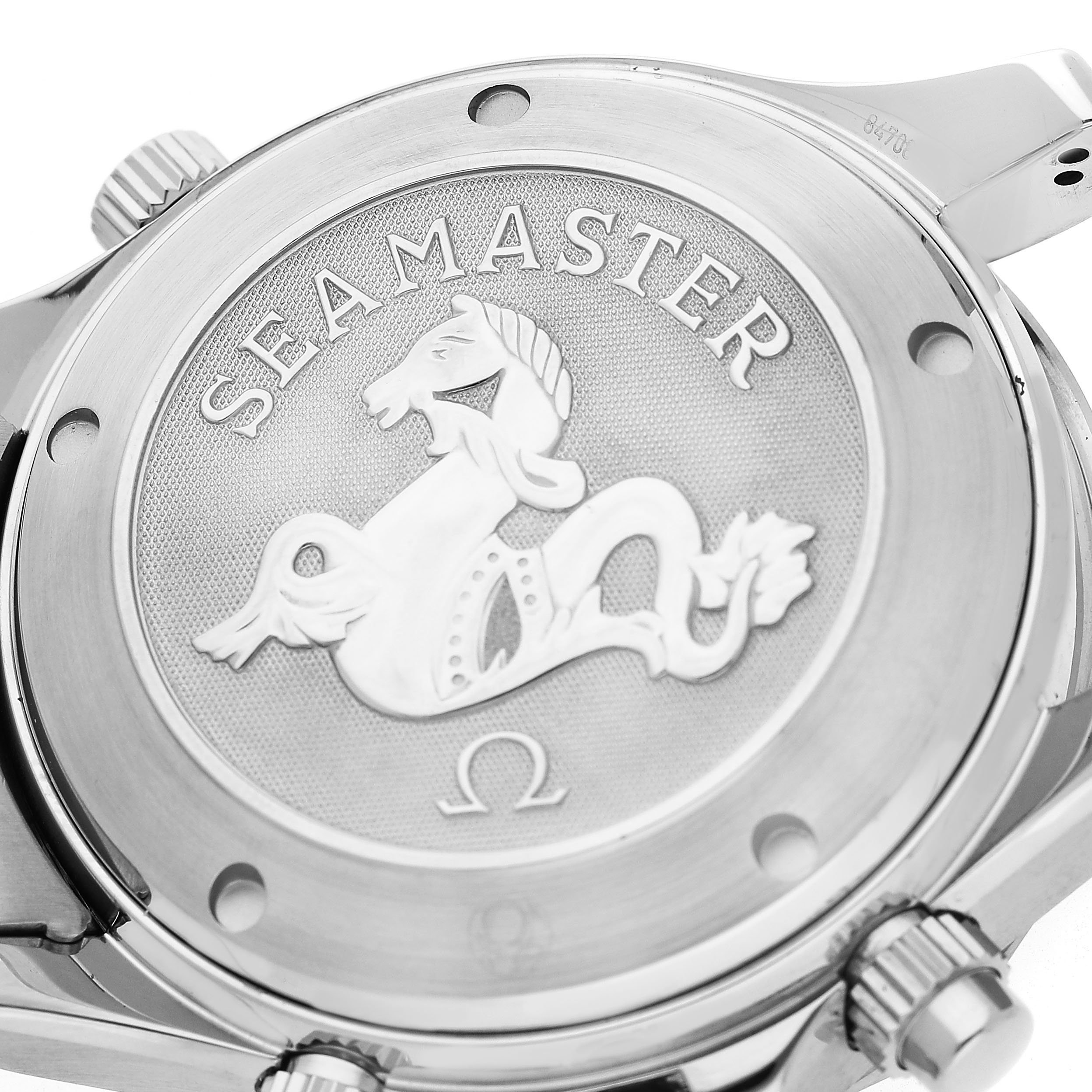 The image shows the case back of an Omega Seamaster 213.30.42.40.01.001 Men's Stainless Steel Black Dial watch featuring an embossed design.
