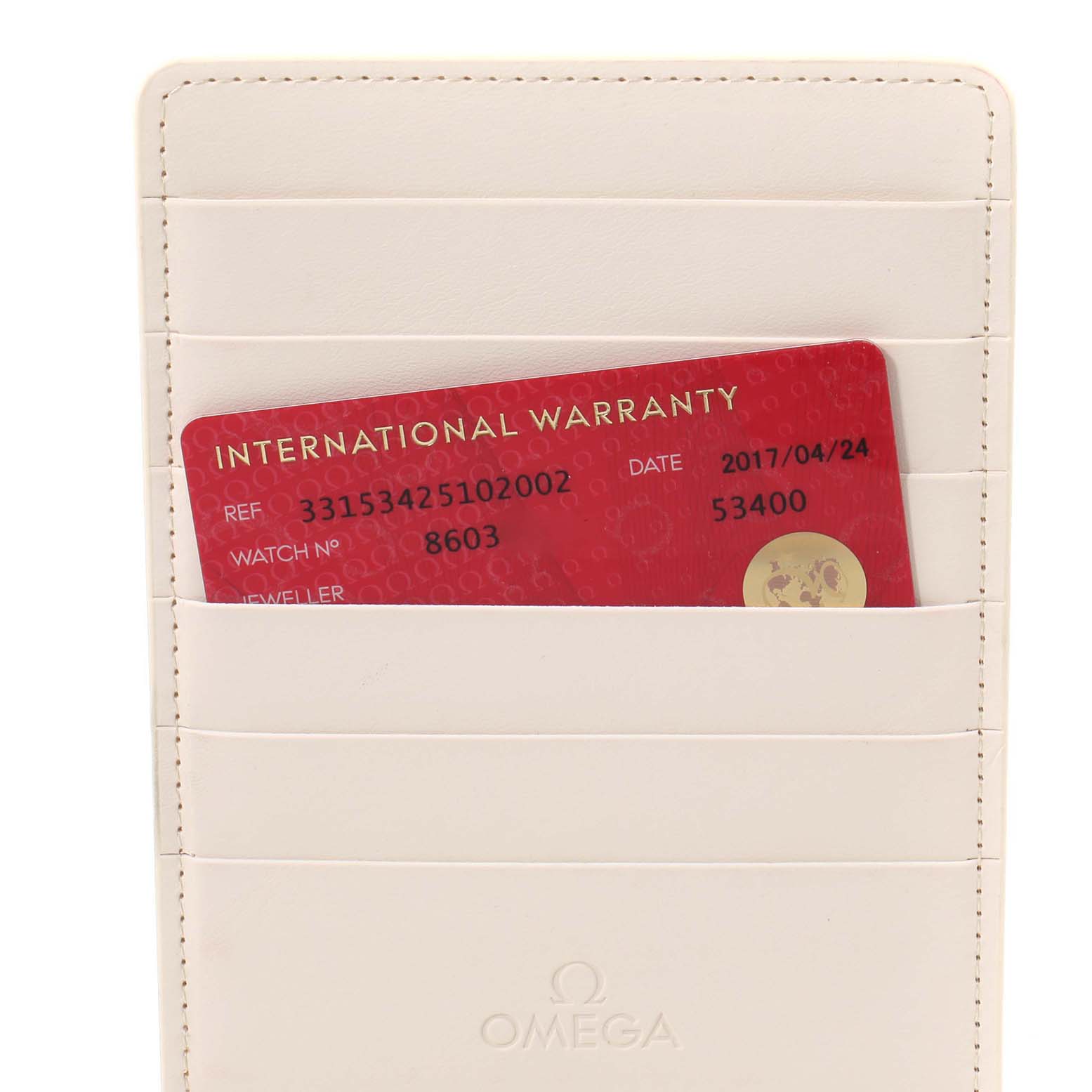The image shows an Omega Speedmaster 331.53.42.51.02.002 Men's Rose Gold Silver Dial 331.53.42.51.02.002 Men's Rose Gold Silver Dial's International Warranty card inside a white cardholder.
