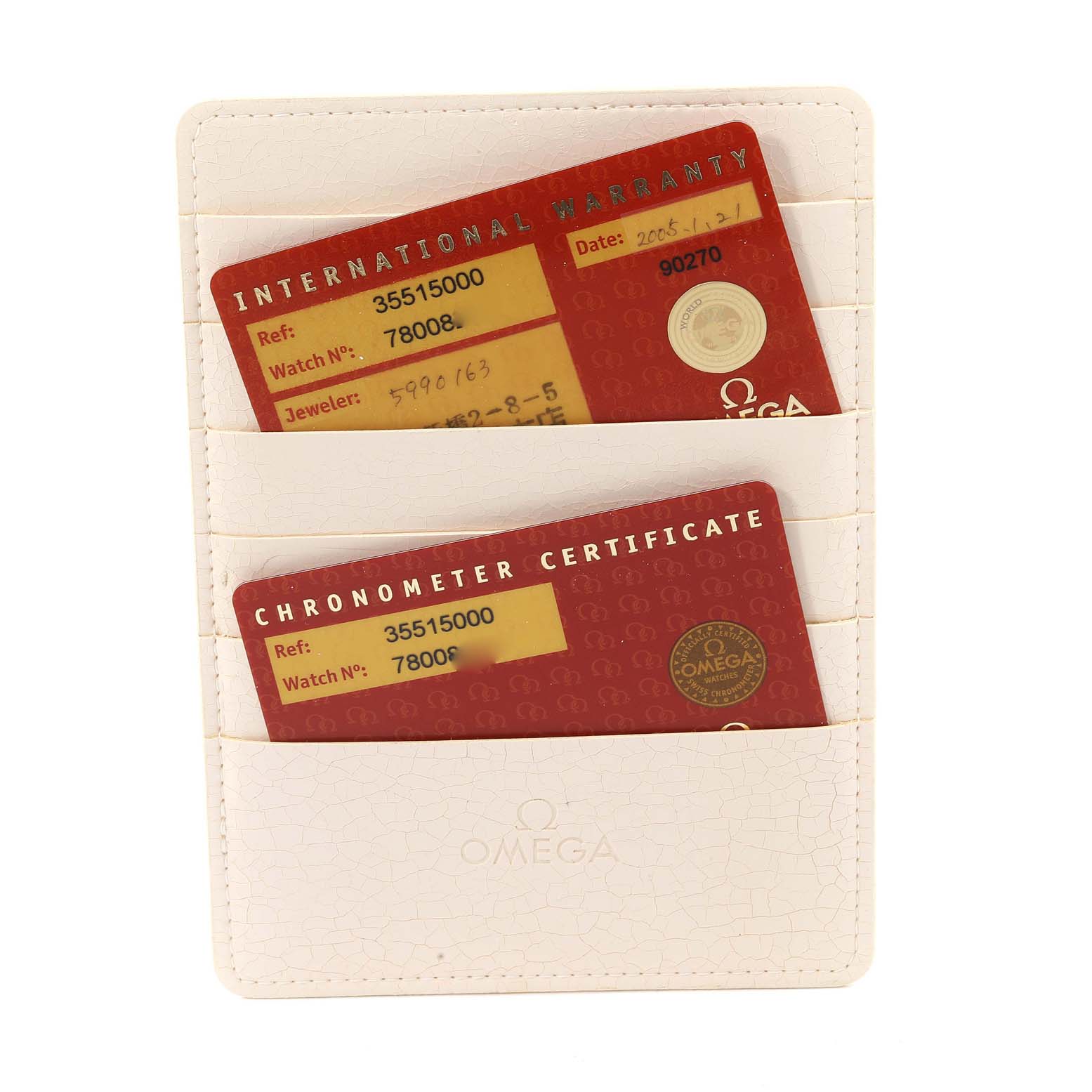 The image shows warranty and chronometer certificate cards for the Omega Speedmaster 3551.50.00 Men's Stainless Steel Black Dial 3551.50.00 Men's Stainless Steel Black Dial in a white cardholder.