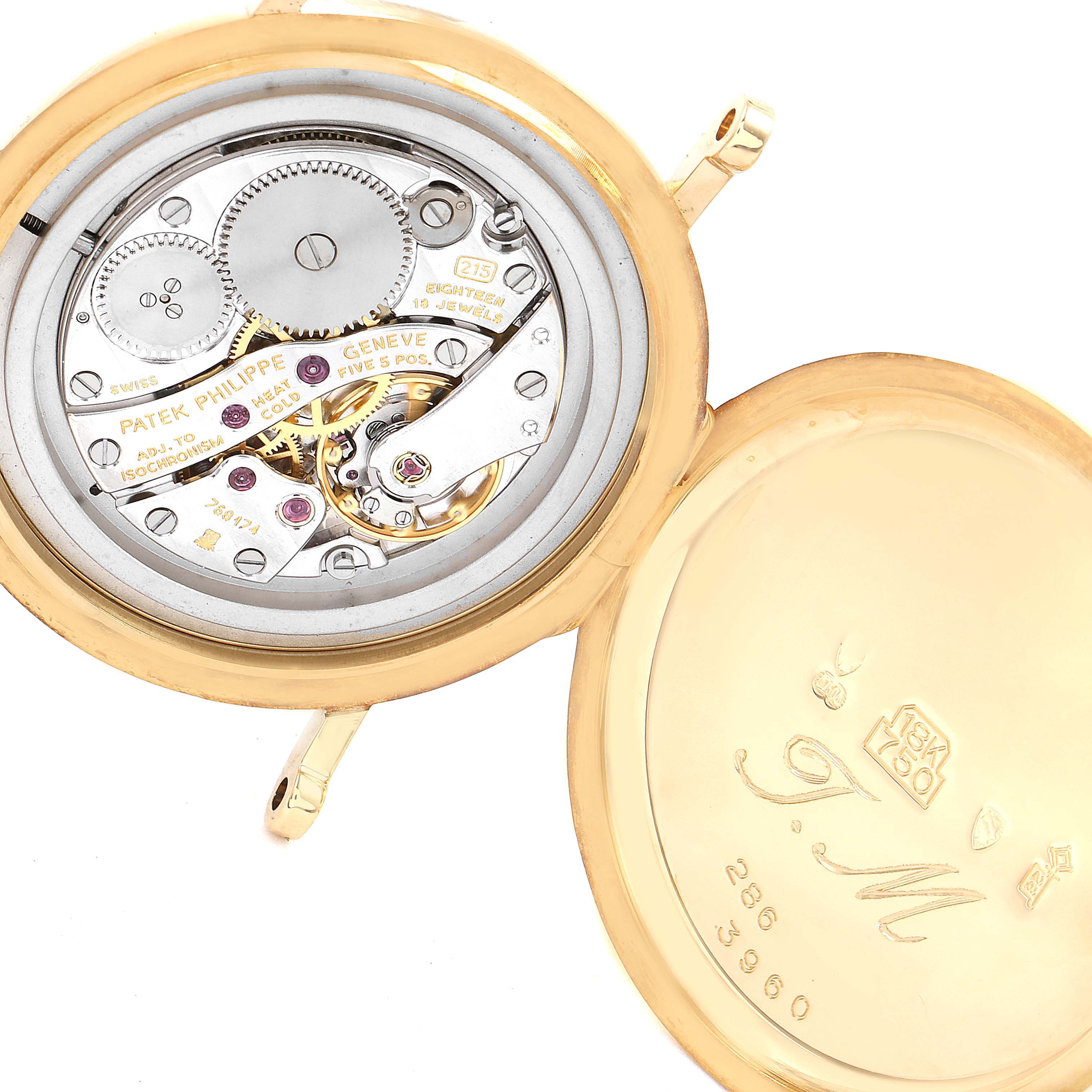 The image shows the open case back of a Patek Philippe Calatrava 3960J Men's Yellow Gold White Dial 3960J Men's Yellow Gold White Dial watch, revealing its mechanical movement.