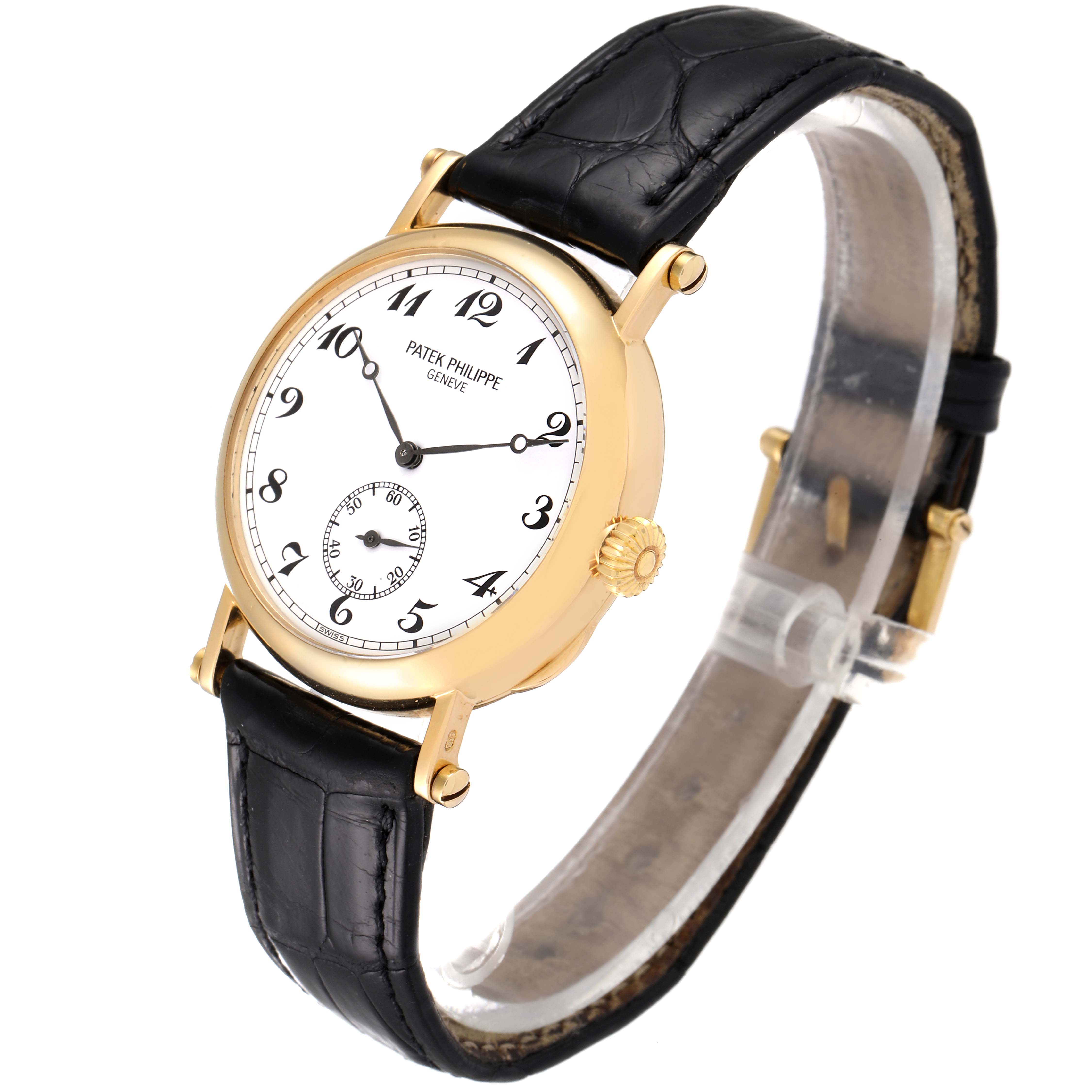 The image shows a side angle view of the Patek Philippe Calatrava 3960J Men's Yellow Gold White Dial 3960J Men's Yellow Gold White Dial watch, highlighting its dial, crown, and black leather strap.