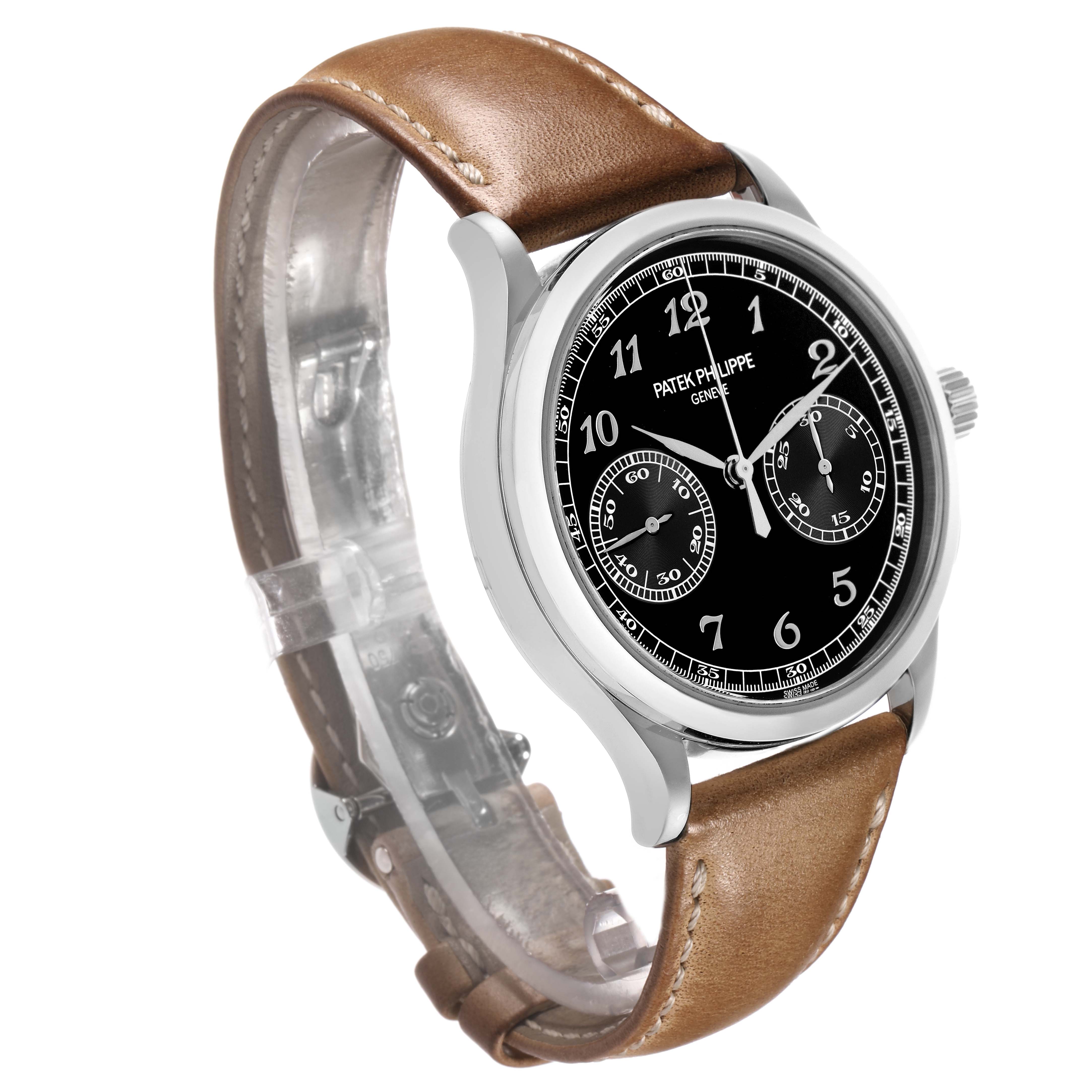 The Patek Philippe Complications 5170G Men
s White Gold Black Dial watch is shown from a three-quarter angle with a brown leather strap and black dial facing forward.