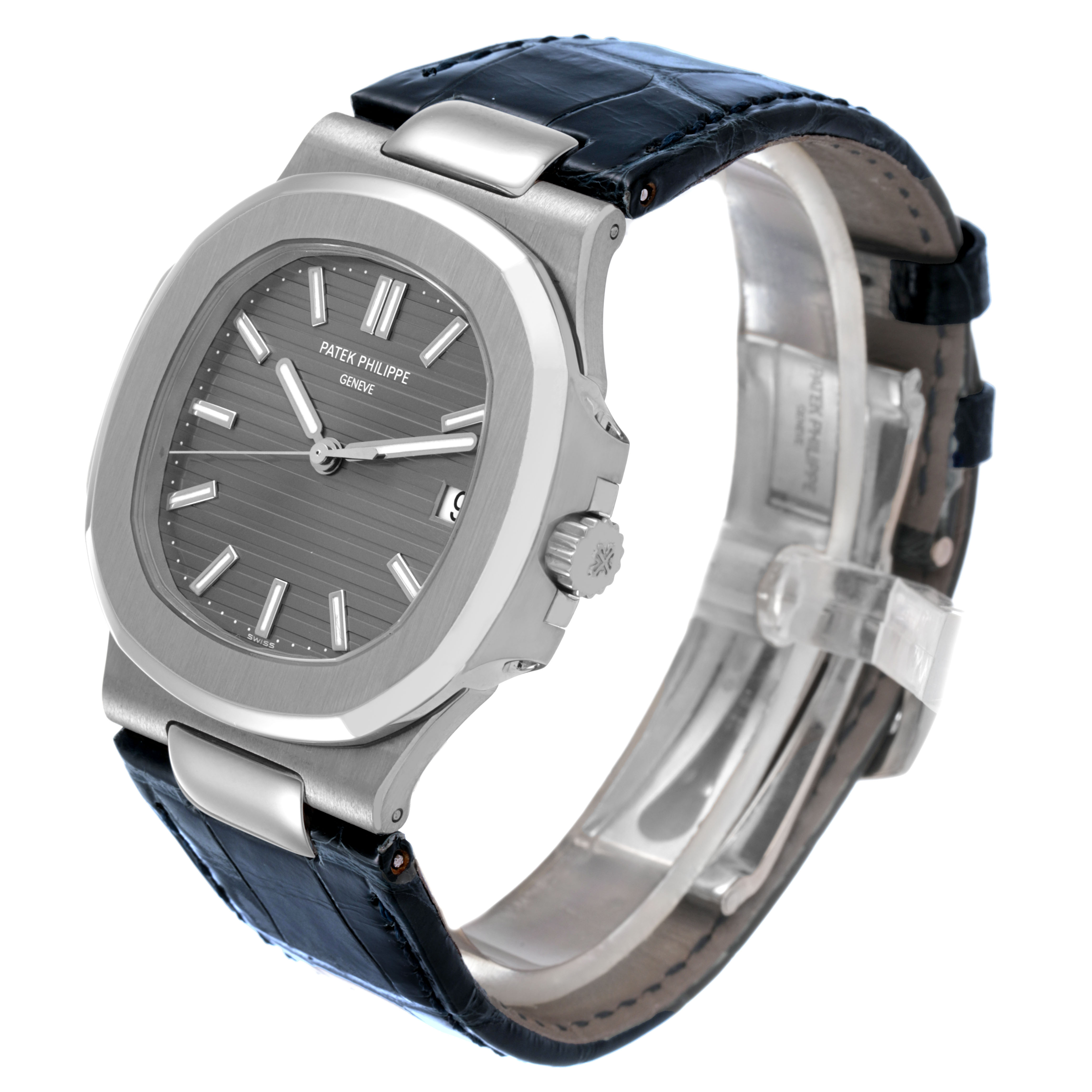 The Patek Philippe Nautilus 5711G-001 Men's White Gold Silver Dial watch is shown at a three-quarter angle, displaying the dial, bezel, crown, and leather strap.