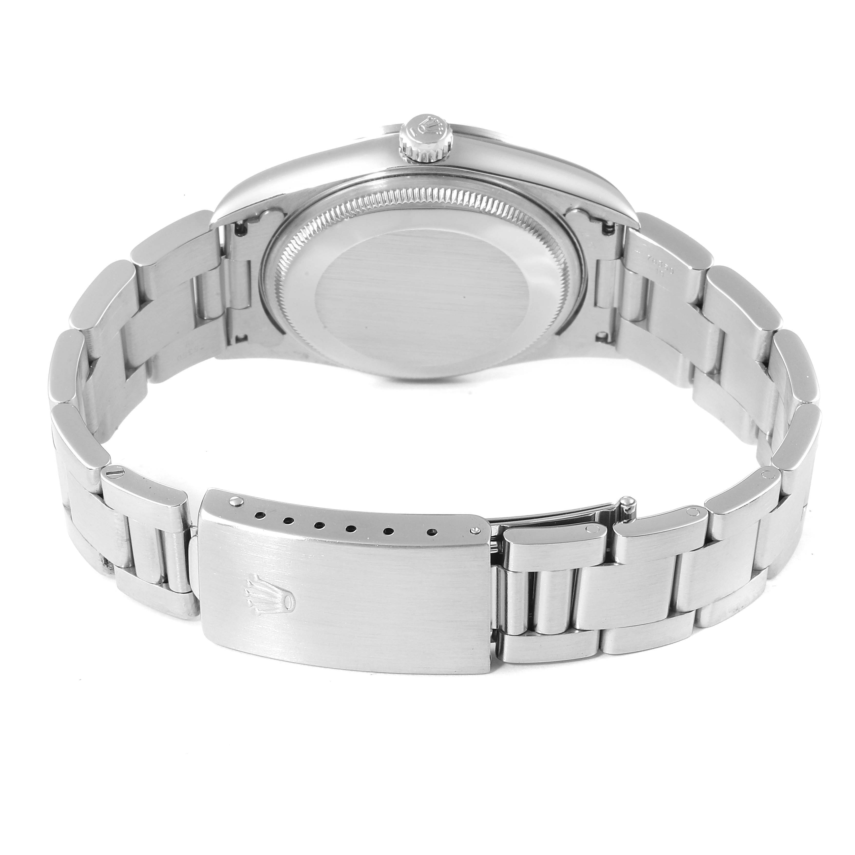 The image shows the back view of a Rolex Air-King 14000 Men's Stainless Steel Black Dial 14000 Men's Stainless Steel Black Dial watch, highlighting the case back, crown, and the closed clasp of the metal bracelet.