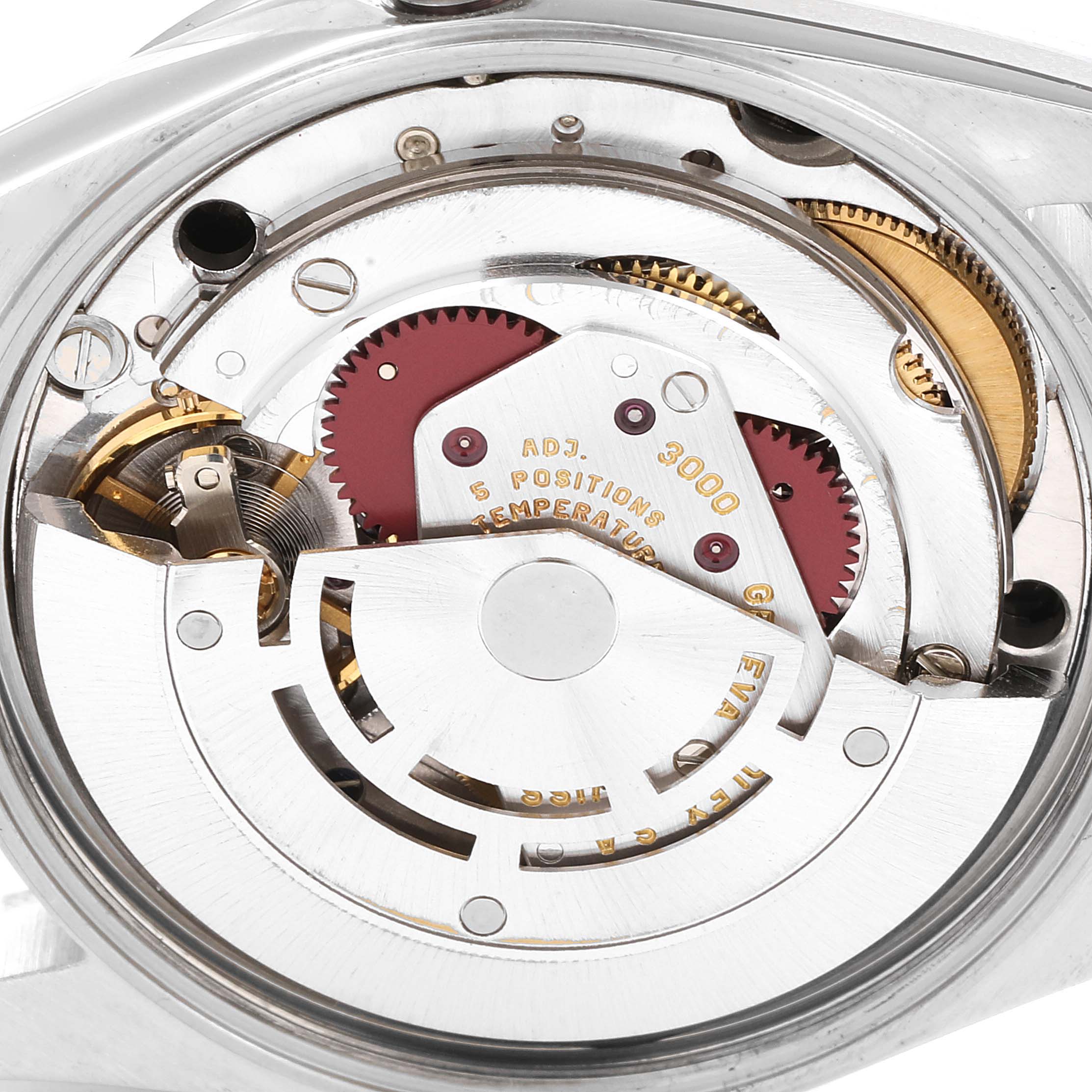 The image shows a close-up of the Air-King model Rolex's inner mechanical movement components.