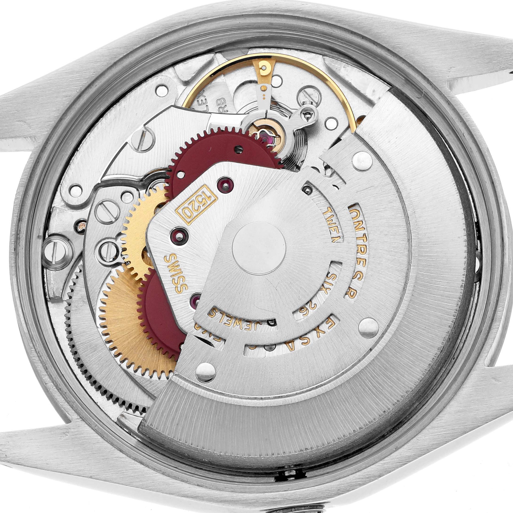 The image shows the movement mechanism of a Rolex Air-King 5500 Men
s Stainless Steel Silver Dial, highlighting gears and rotors.