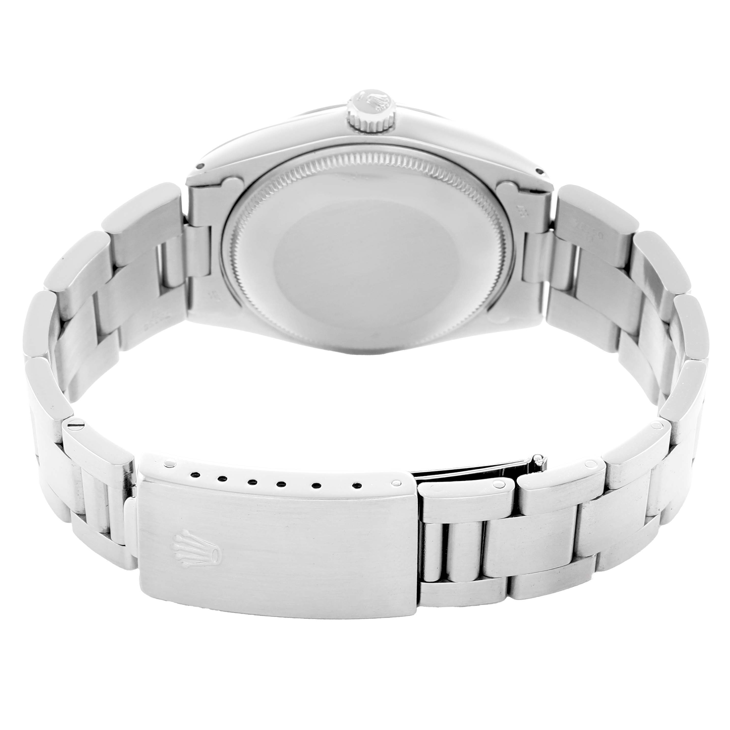 The image shows the back and clasp of a Rolex Air-King 5500 Men
s Stainless Steel Silver Dial watch, highlighting the bracelet and crown.