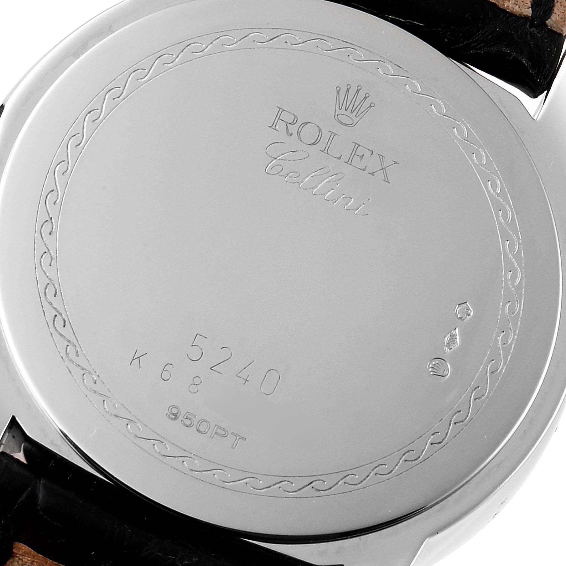 The image shows the back case of a Rolex Cellini 5240 Men
s Platinum Mother of Pearl Dial 5240 Men
s Platinum Mother of Pearl Dial model watch, highlighting its engravings and markings.