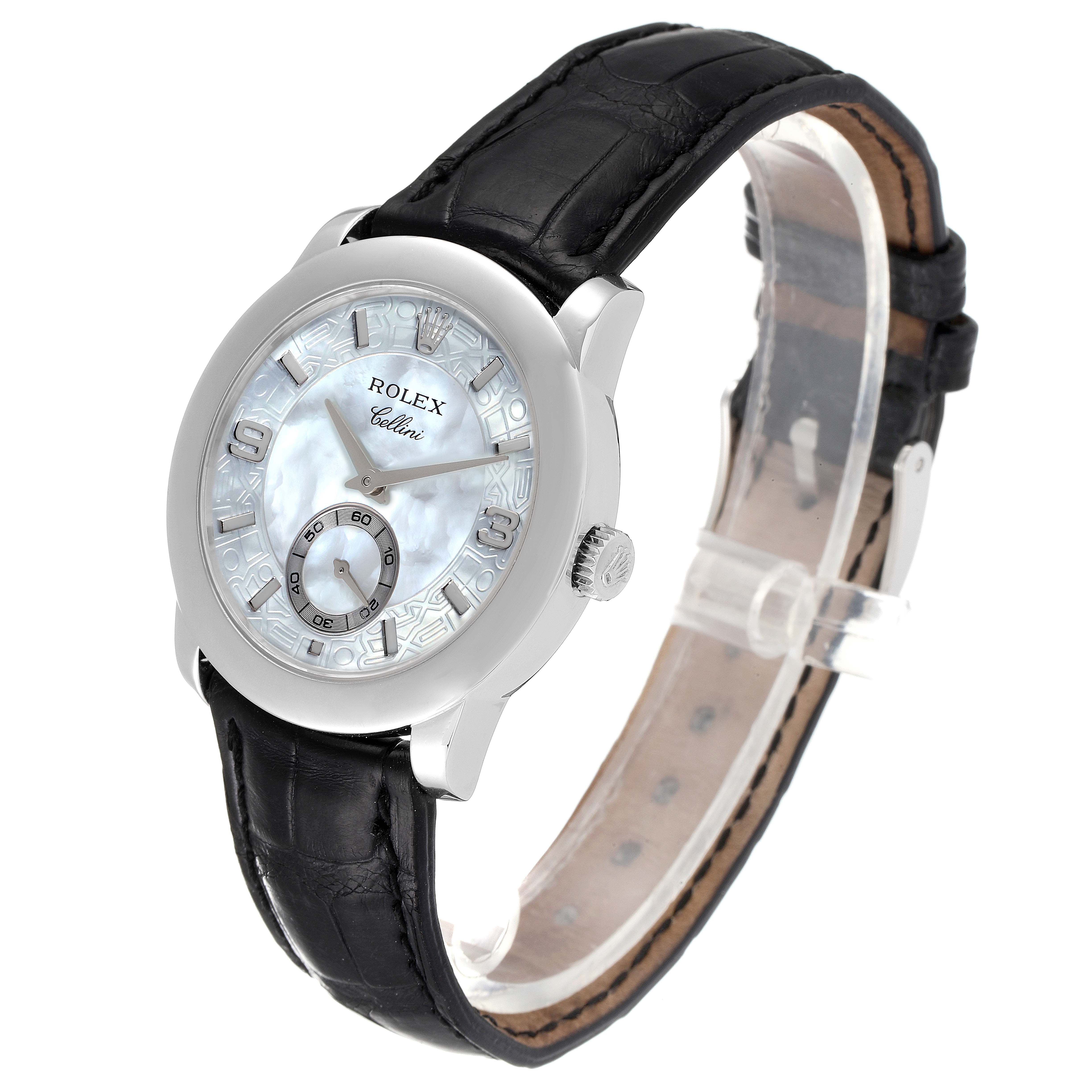 The Rolex Cellini 5240 Men
s Platinum Mother of Pearl Dial 5240 Men
s Platinum Mother of Pearl Dial watch is shown at an angled side view, displaying its face, leather strap, and crown.
