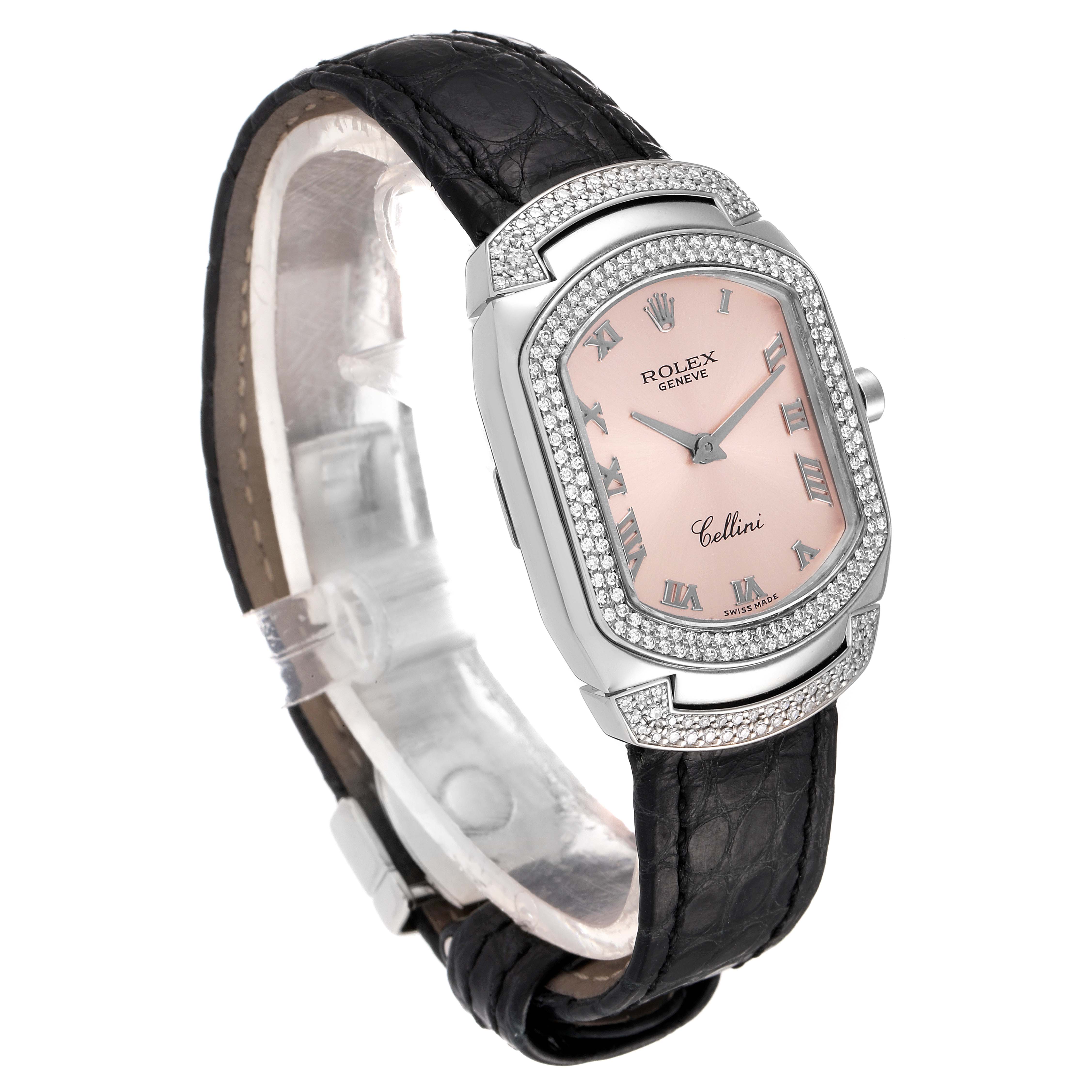 The image shows a side and partial top view of the Rolex Cellini 6693 Women's White Gold Pink Dial 6693 Women's White Gold Pink Dial watch, highlighting its black leather strap, pink dial, and diamond-set bezel.