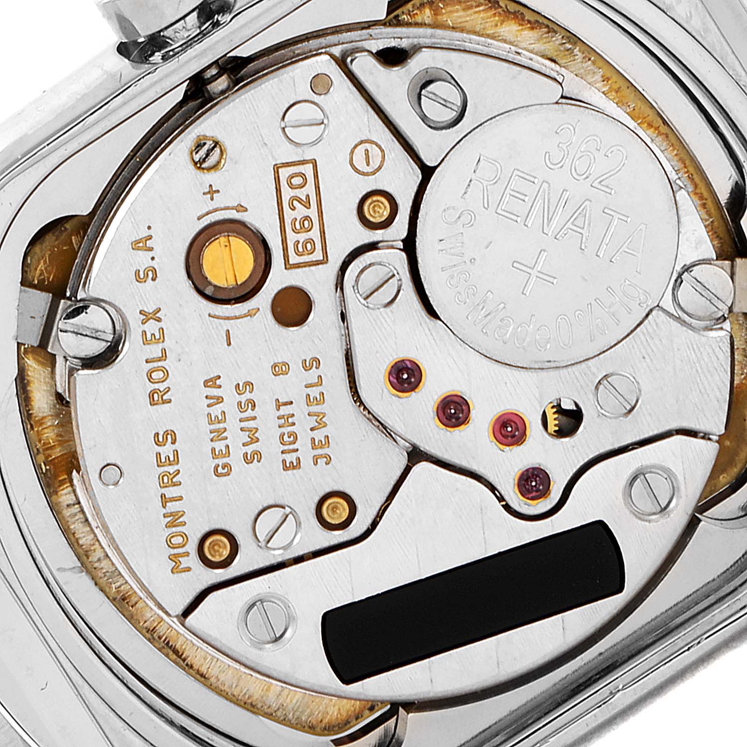 This image shows a close-up view of the movement mechanism inside a Rolex Cellini 6693 Women's White Gold Pink Dial 6693 Women's White Gold Pink Dial watch.