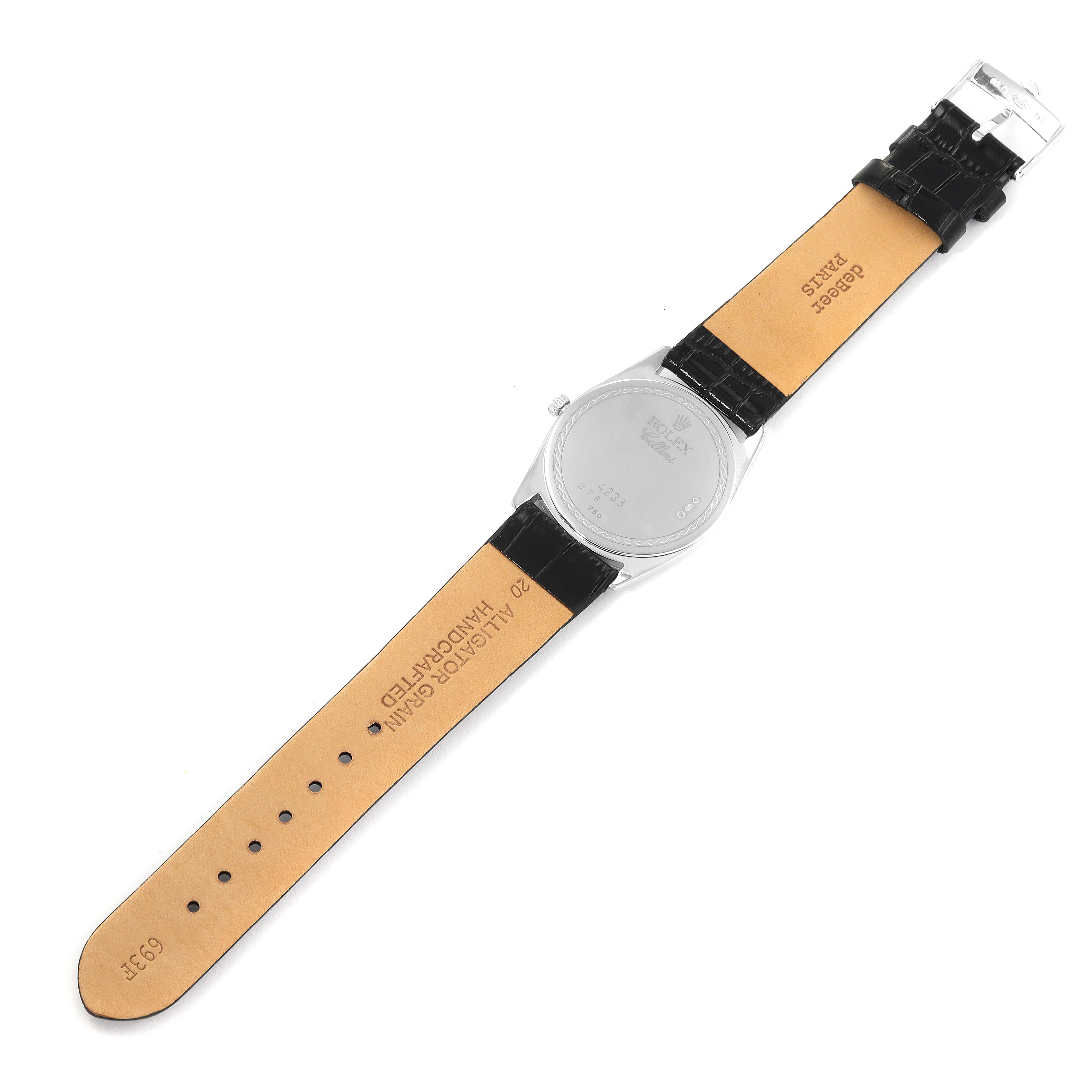 The image shows the back view of a Rolex Cellini 4233 Men
s White Gold Black Dial 4233 Men
s White Gold Black Dial watch, displaying the case back and leather strap.