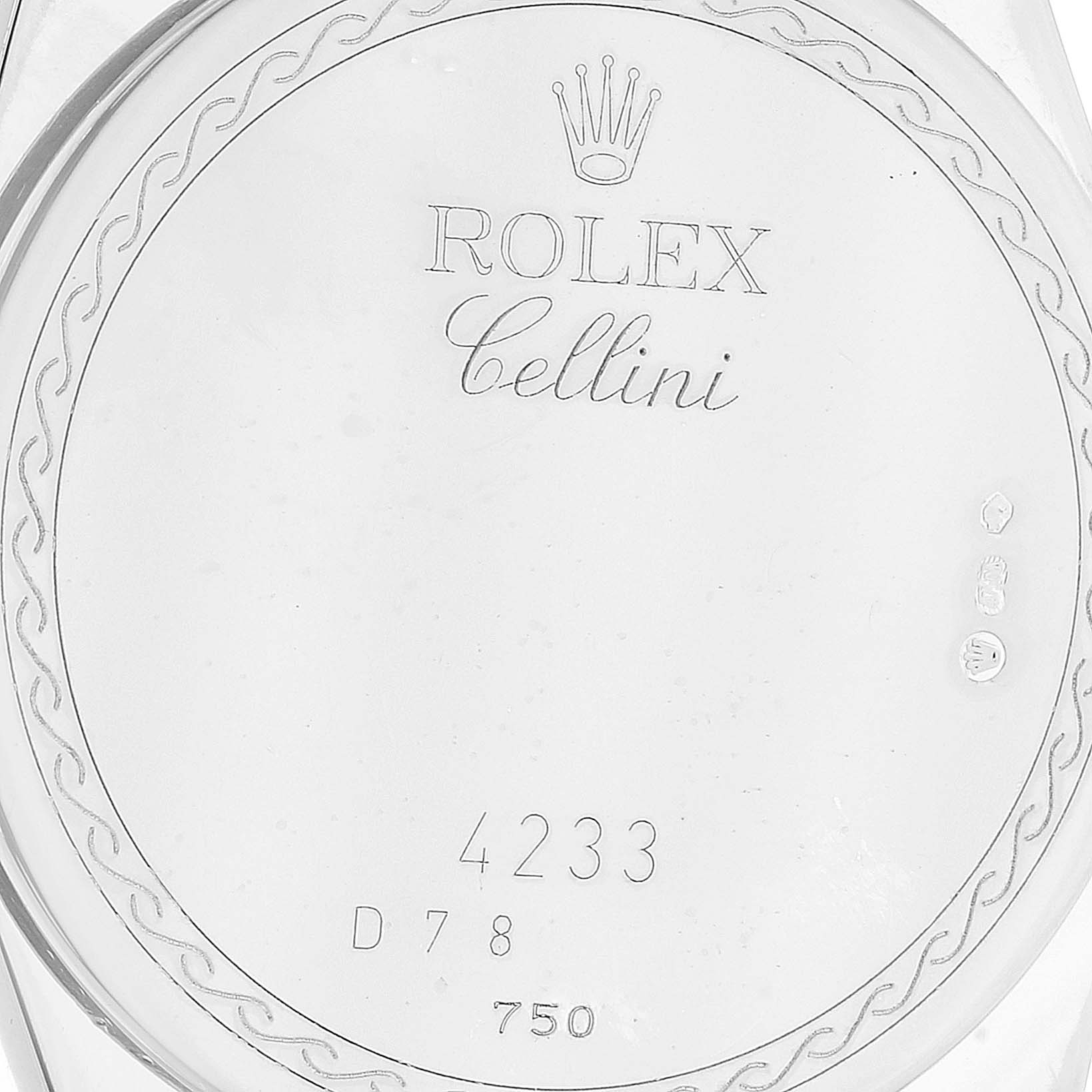 The image shows the case back of a Rolex Cellini 4233 Men
s White Gold Black Dial 4233 Men
s White Gold Black Dial watch engraved with the Rolex logo, model name, and serial numbers.