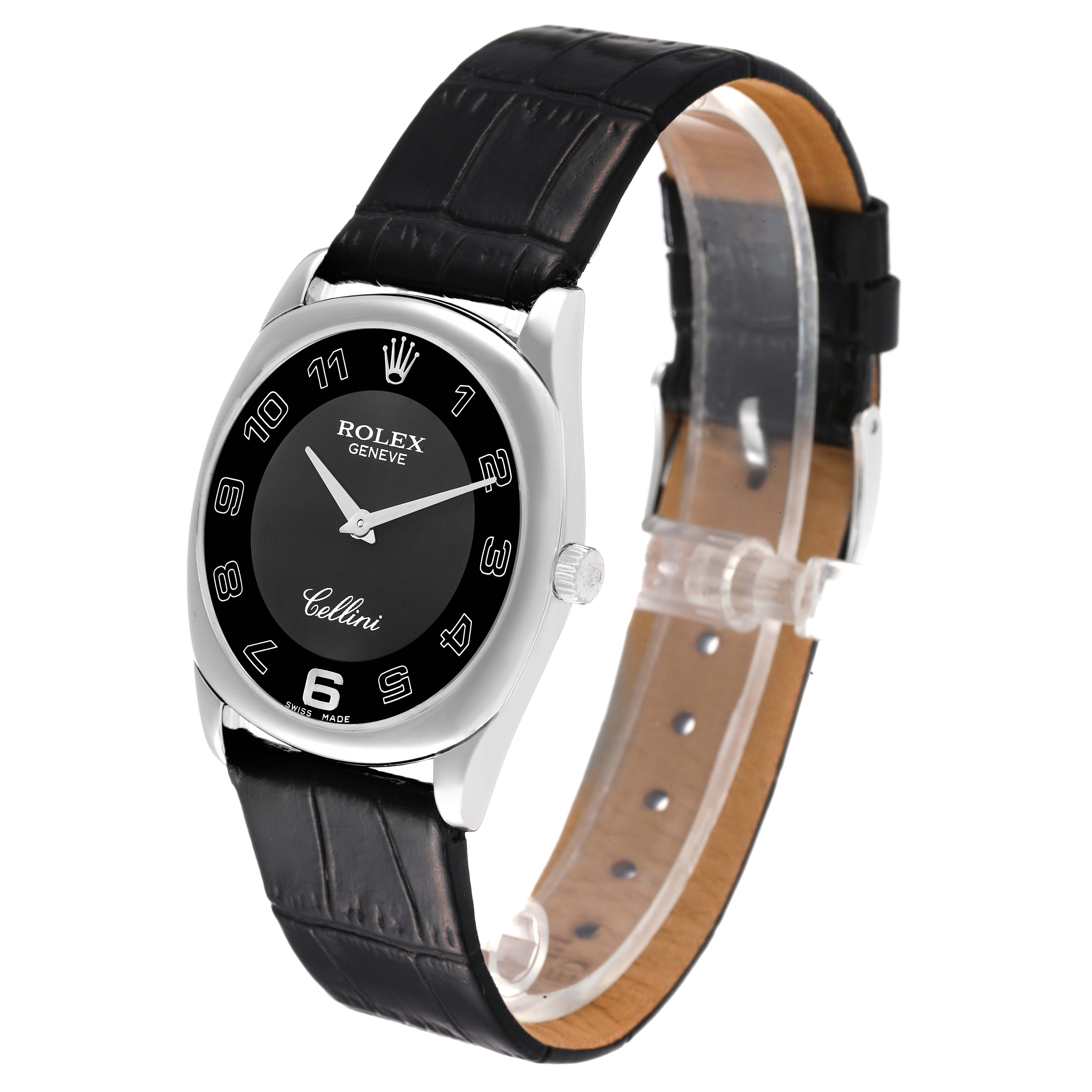 The Rolex Cellini 4233 Men
s White Gold Black Dial 4233 Men
s White Gold Black Dial watch is shown at a slight angle, highlighting its black dial, silver case, and leather strap.
