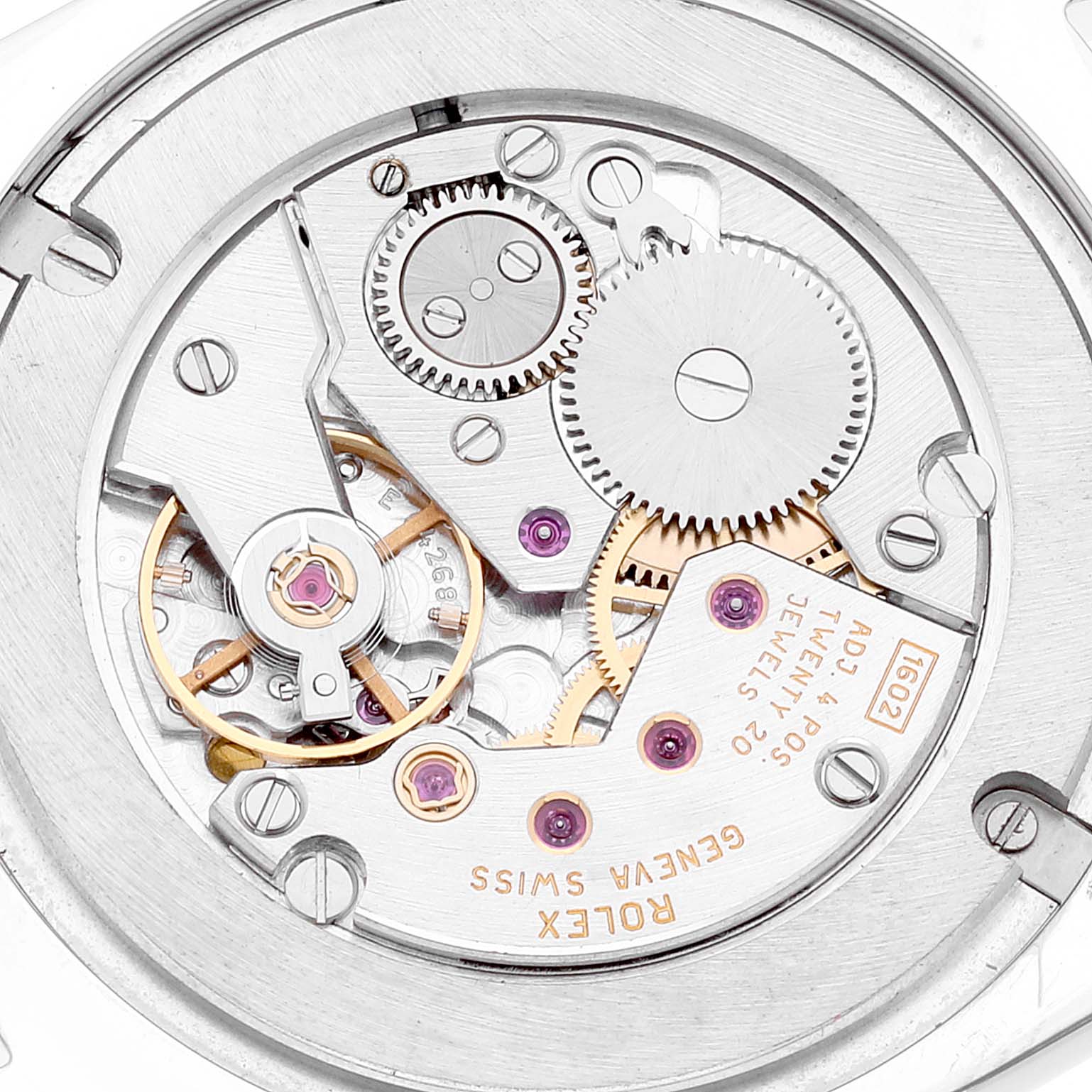 This image shows the intricate mechanical movement of a Rolex Cellini 4233 Men
s White Gold Black Dial 4233 Men
s White Gold Black Dial watch, viewed from the back casing.