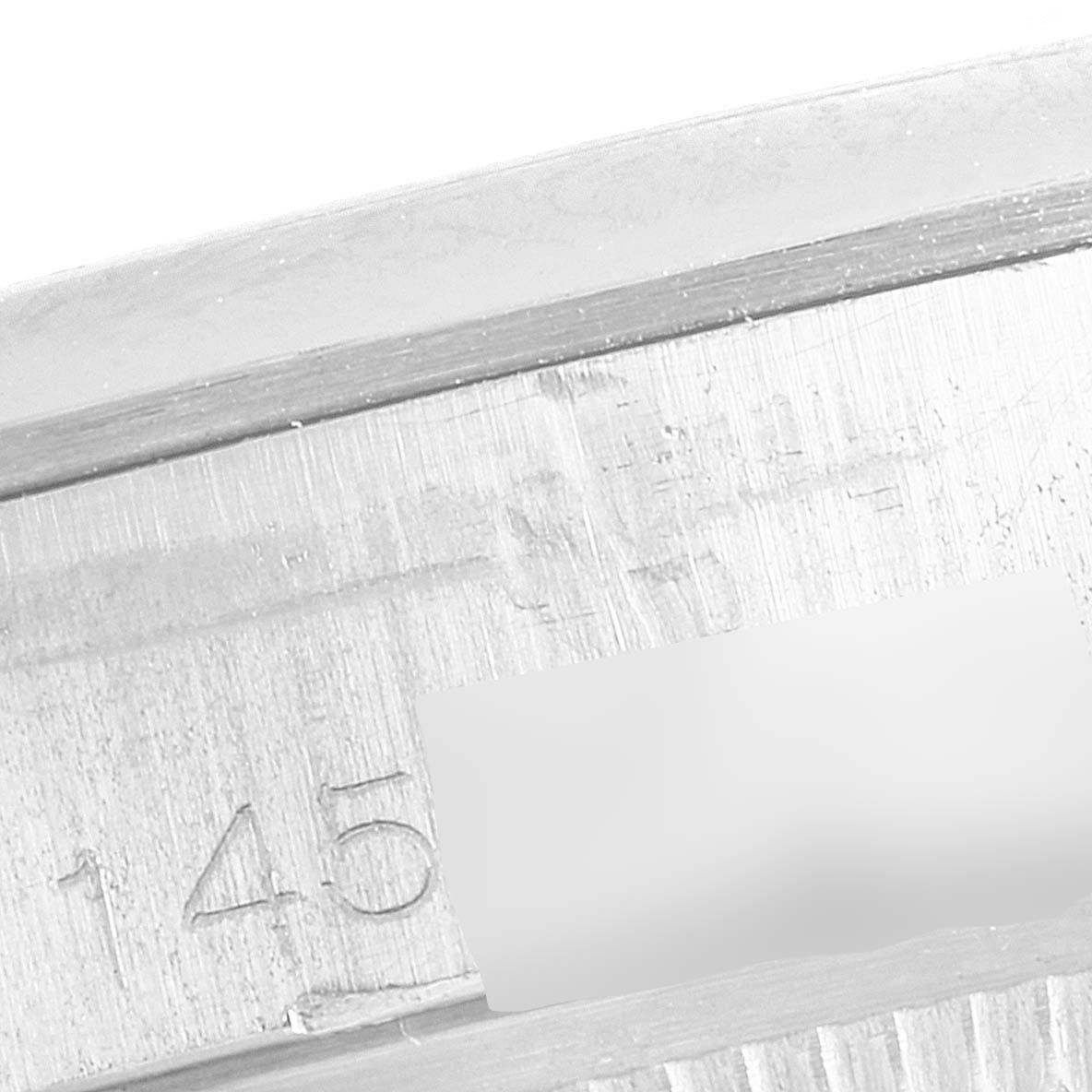 The image shows a close-up of the engraved model number on the case back rim of a Rolex Vintage Collection 1500 Men's Stainless Steel Silver Dial 1500 Men's Stainless Steel Silver Dial watch.