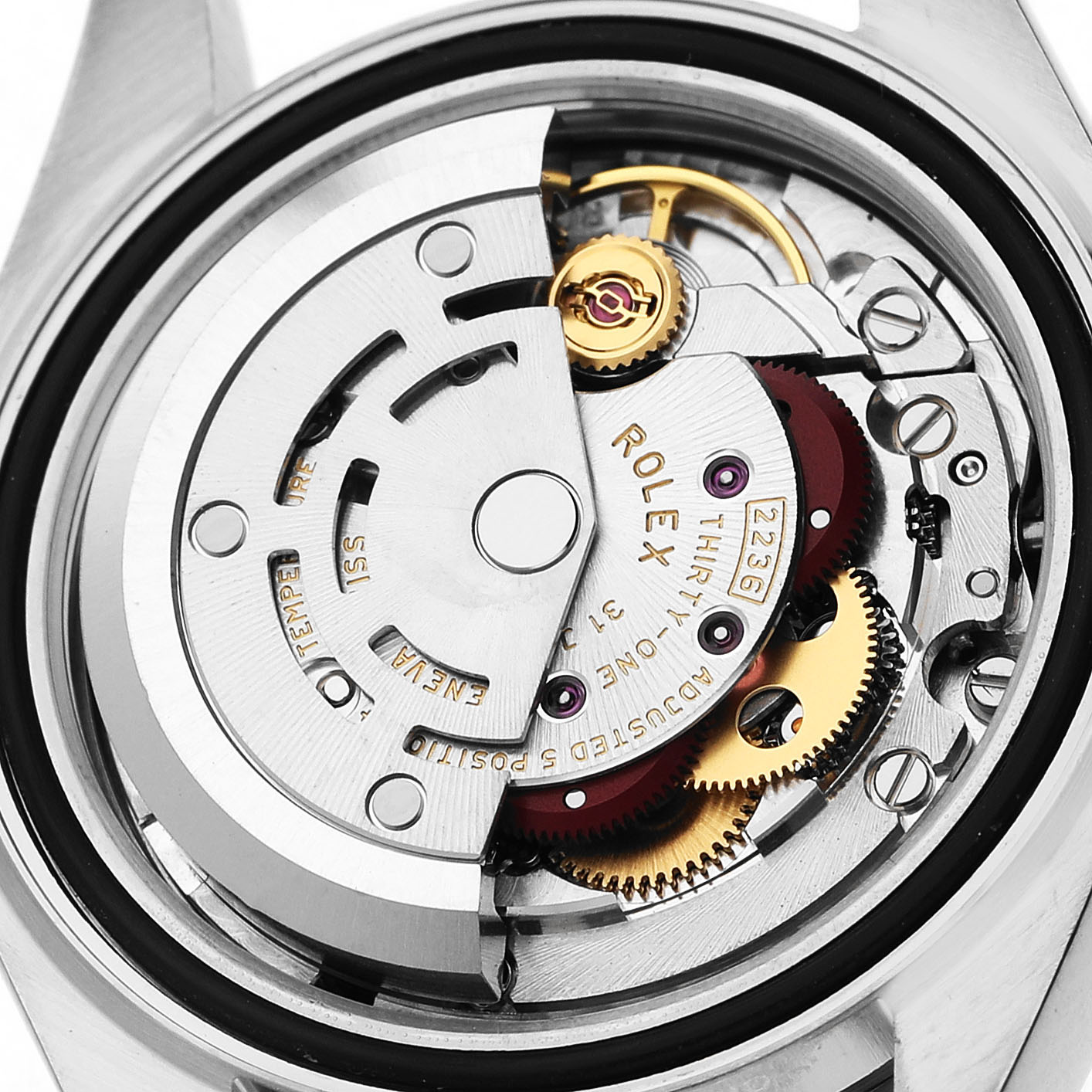 The image shows a close-up of the movement of a Rolex Datejust 279174 Women's Stainless Steel Pink Dial watch, focusing on the rotor and internal gears.
