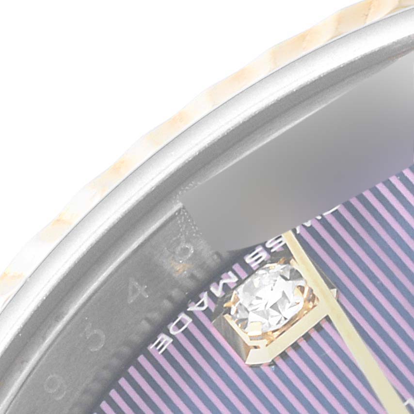 The image shows a close-up of the dial and bezel of a Rolex Datejust 279173 Women's Stainless Steel Purple Dial 279173 Women's Stainless Steel Purple Dial watch, highlighting the hour markers and part of the watch face.